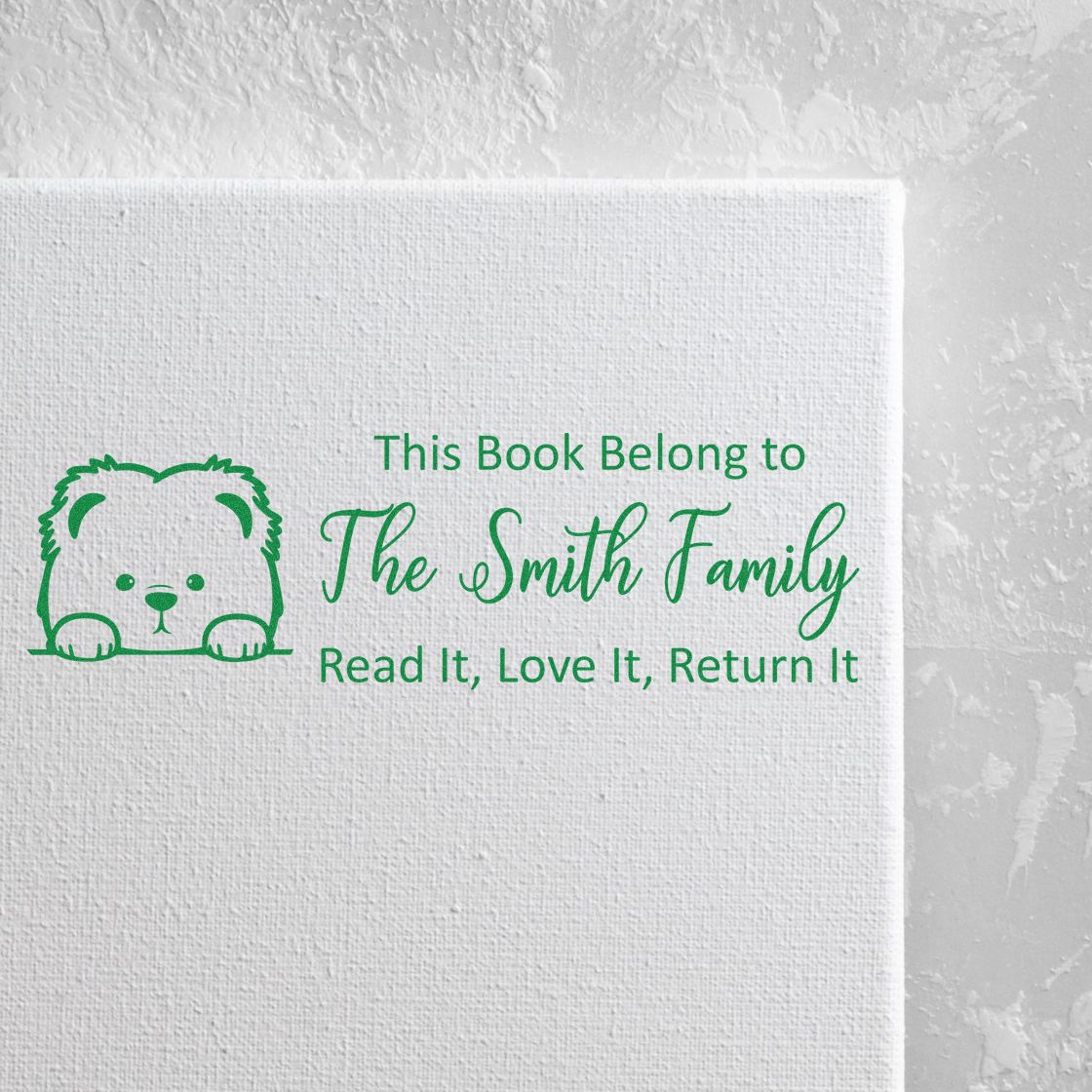 Custom book belongs to stamp for The Smith Family, with bear design and Read It, Love It, Return It message.