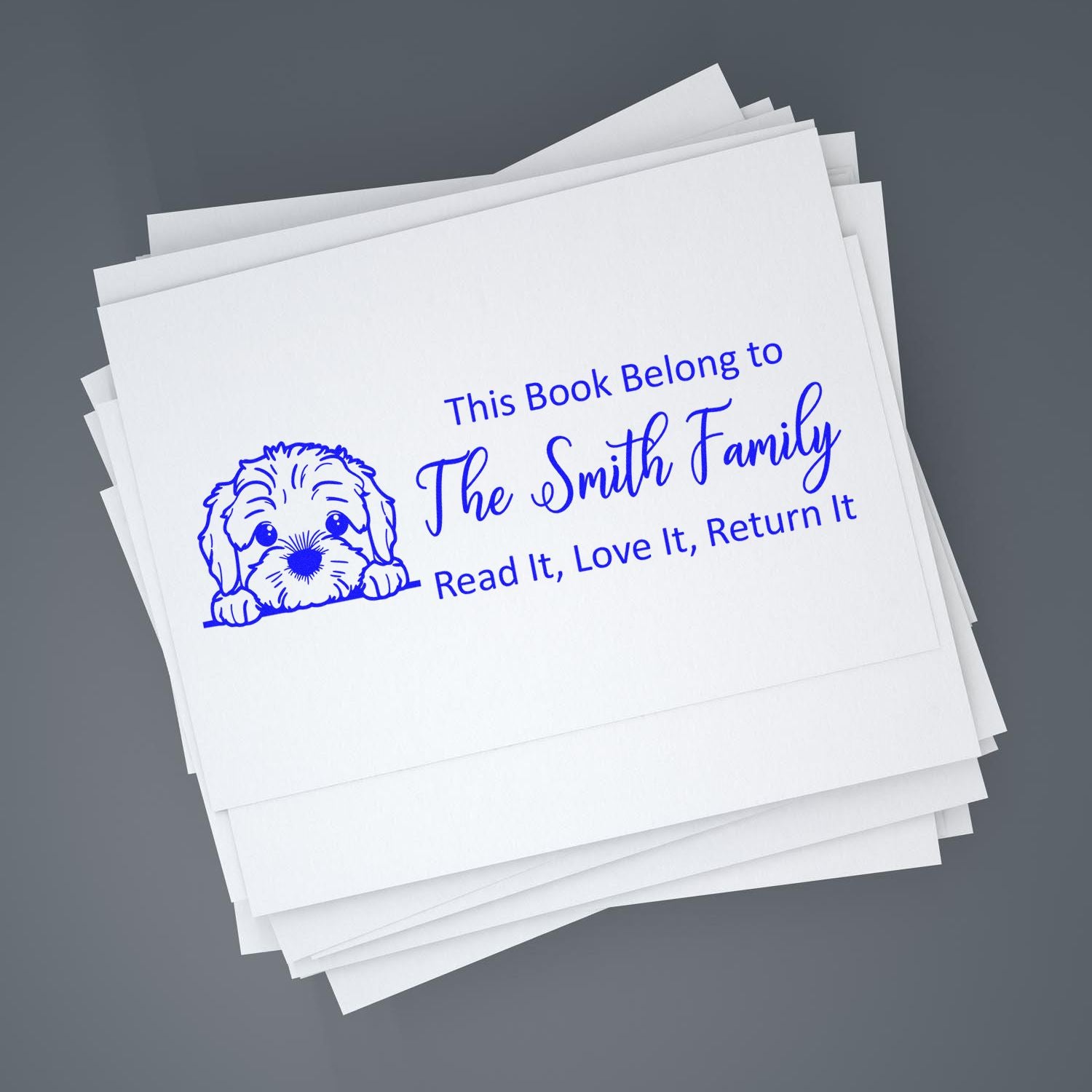 Personalized book stamp for The Smith Family with dog illustration and Read It, Love It, Return It ownership message.
