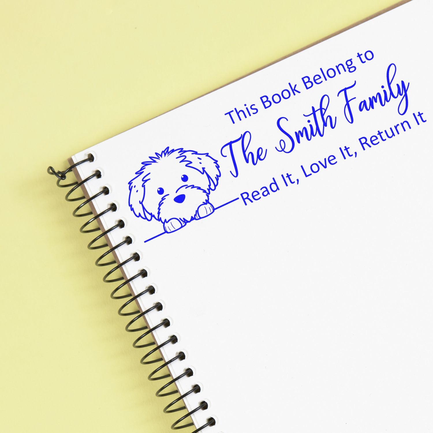Custom rubber stamp for personal library books: dog bookplate reading This Book Belongs to The Smith Family, Read It, Love It, Return It.