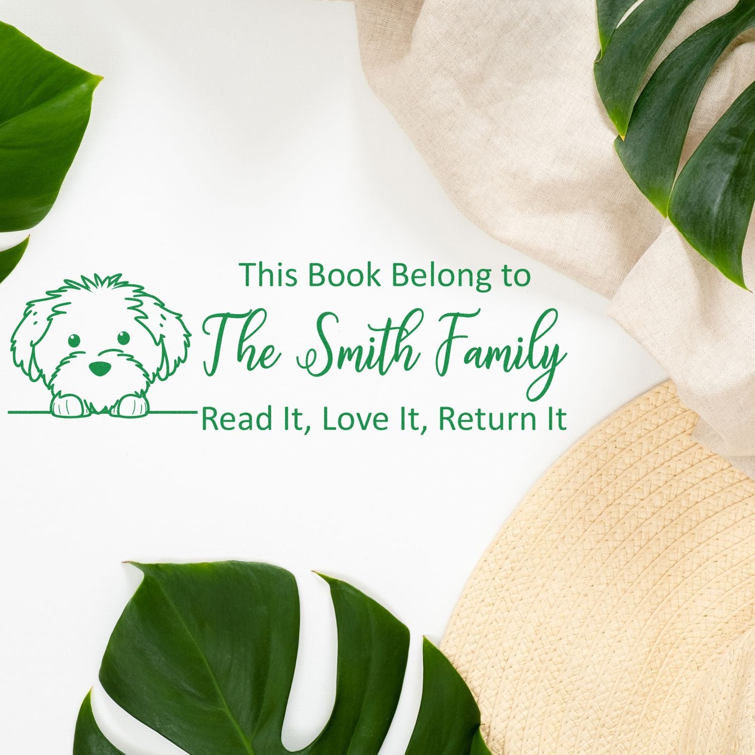 Custom rubber stamp for library books with dog illustration: This Book Belongs to The Smith Family, Read It, Love It, Return It.
