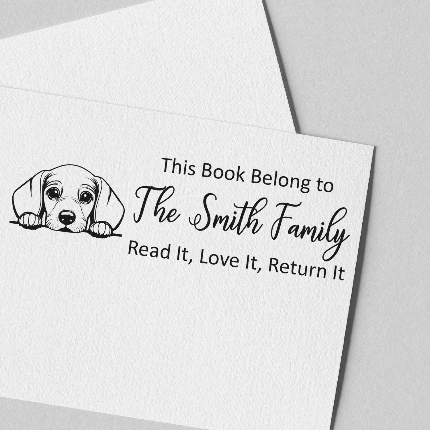 Custom dog bookplate rubber stamp for books: This Book Belong to The Smith Family, Read It, Love It, Return It.
