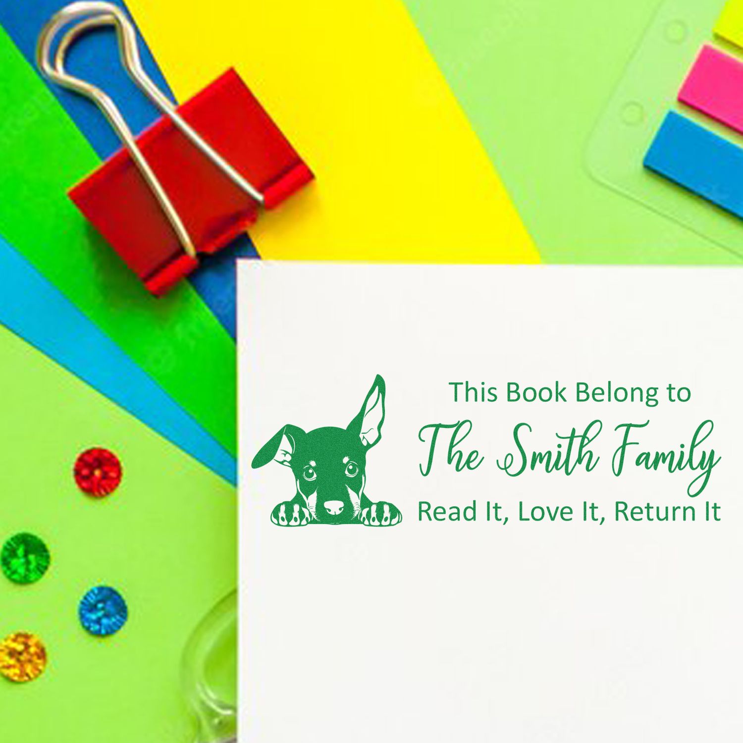 Personalized rubber stamp bookplate for The Smith Family with dog design and Read It, Love It, Return It message.