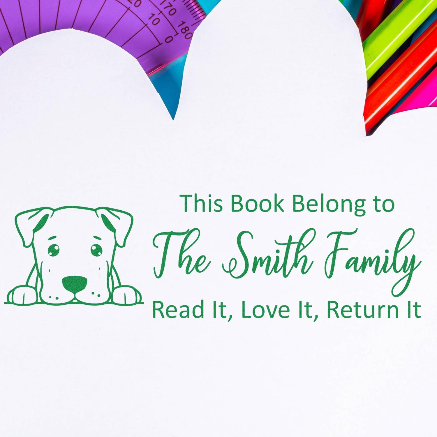 Personalized rubber book stamp with dog icon for The Smith Family, reading: Read It, Love It, Return It.