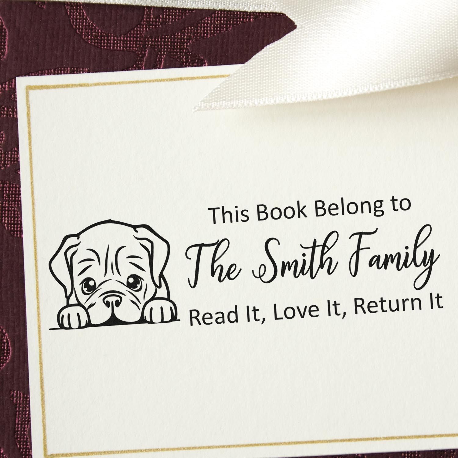 Personalized rubber book stamp with puppy design: This Book Belongs to The Smith Family, Read It, Love It, Return It.