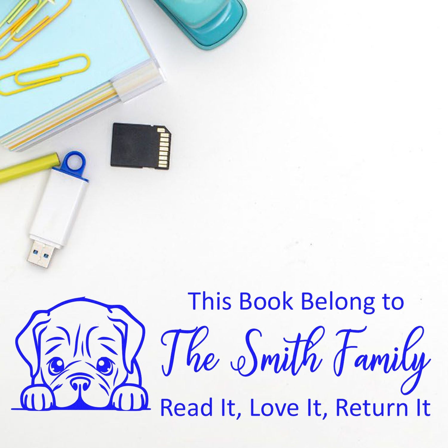 Personalized rubber book stamp with dog design and Smith Family text: This Book Belongs to... Read It, Love It, Return It.