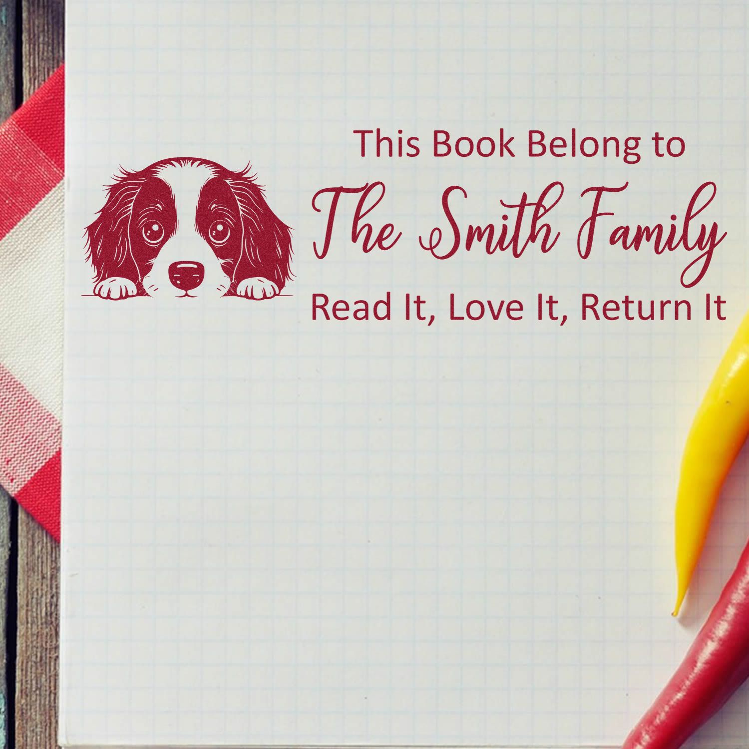Personalized dog library book stamp for The Smith Family with This Book Belongs To and Read It, Love It, Return It text.