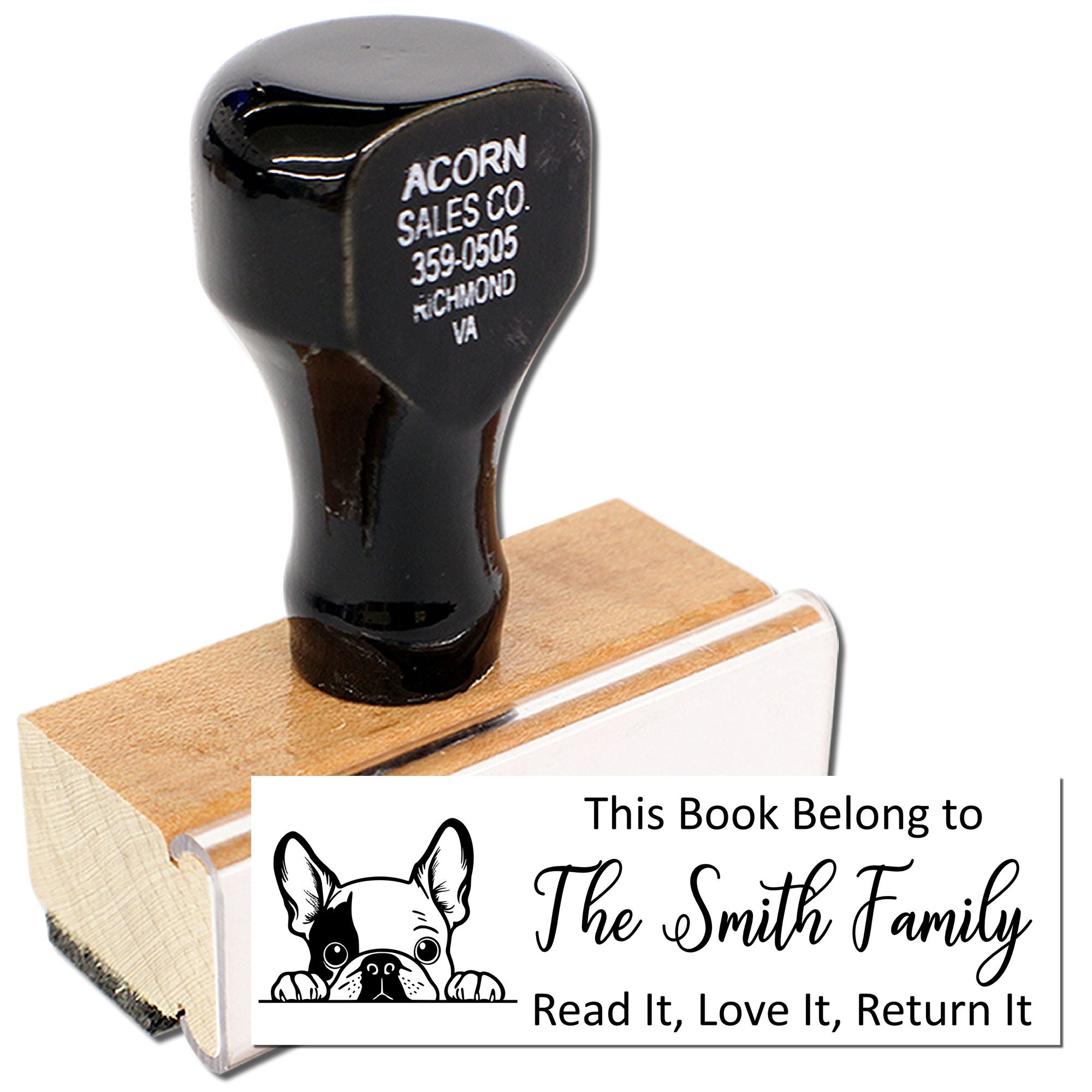 Custom book rubber stamp with dog design and This Book Belongs to The Smith Family return-it message.