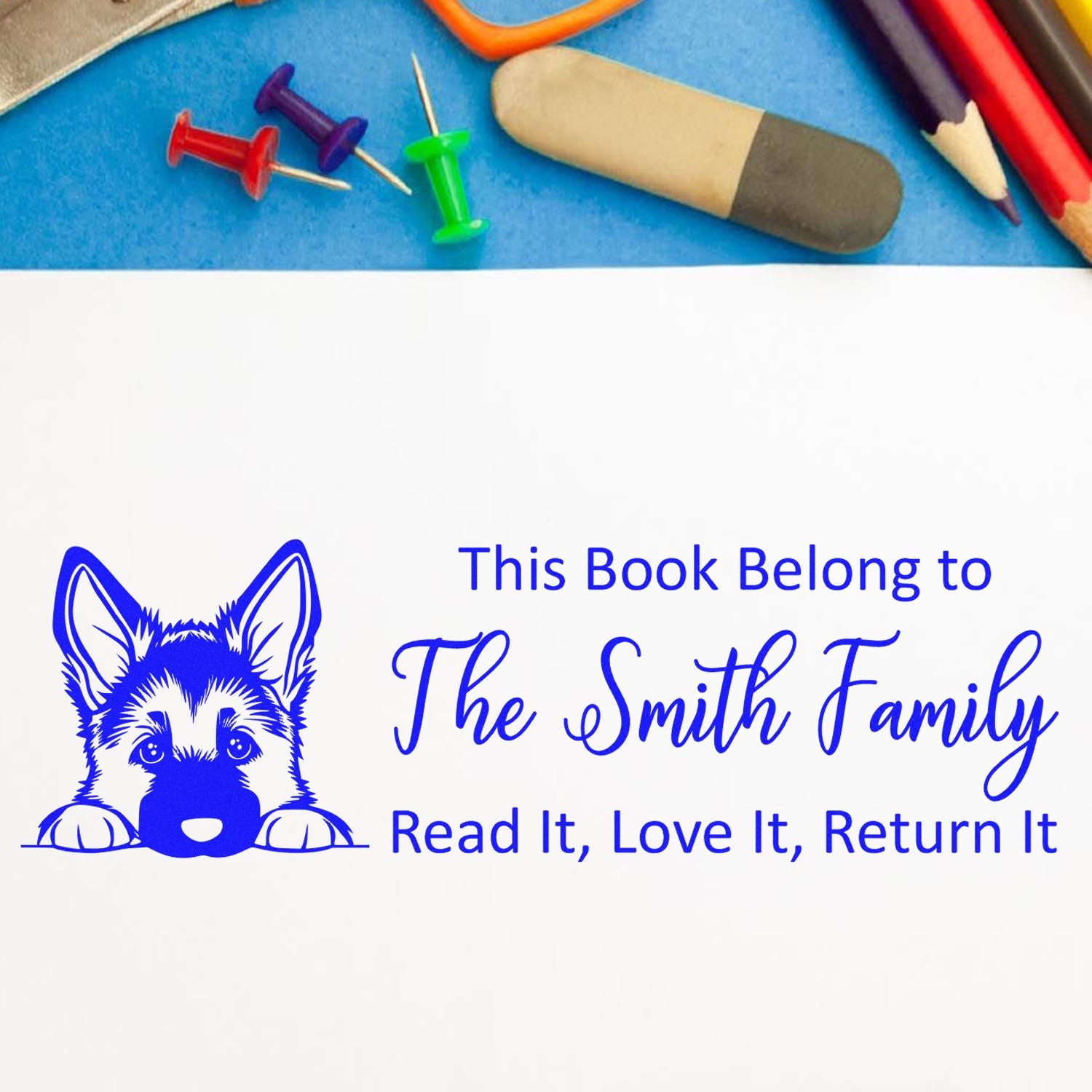 Personalized dog book stamp with This Book Belongs to The Smith Family and Read It, Love It, Return It for home library books.