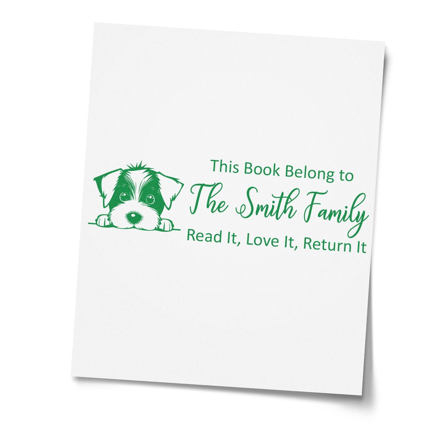 Personalized rubber book stamp with dog illustration and This Book Belong to The Smith Family return-book message.
