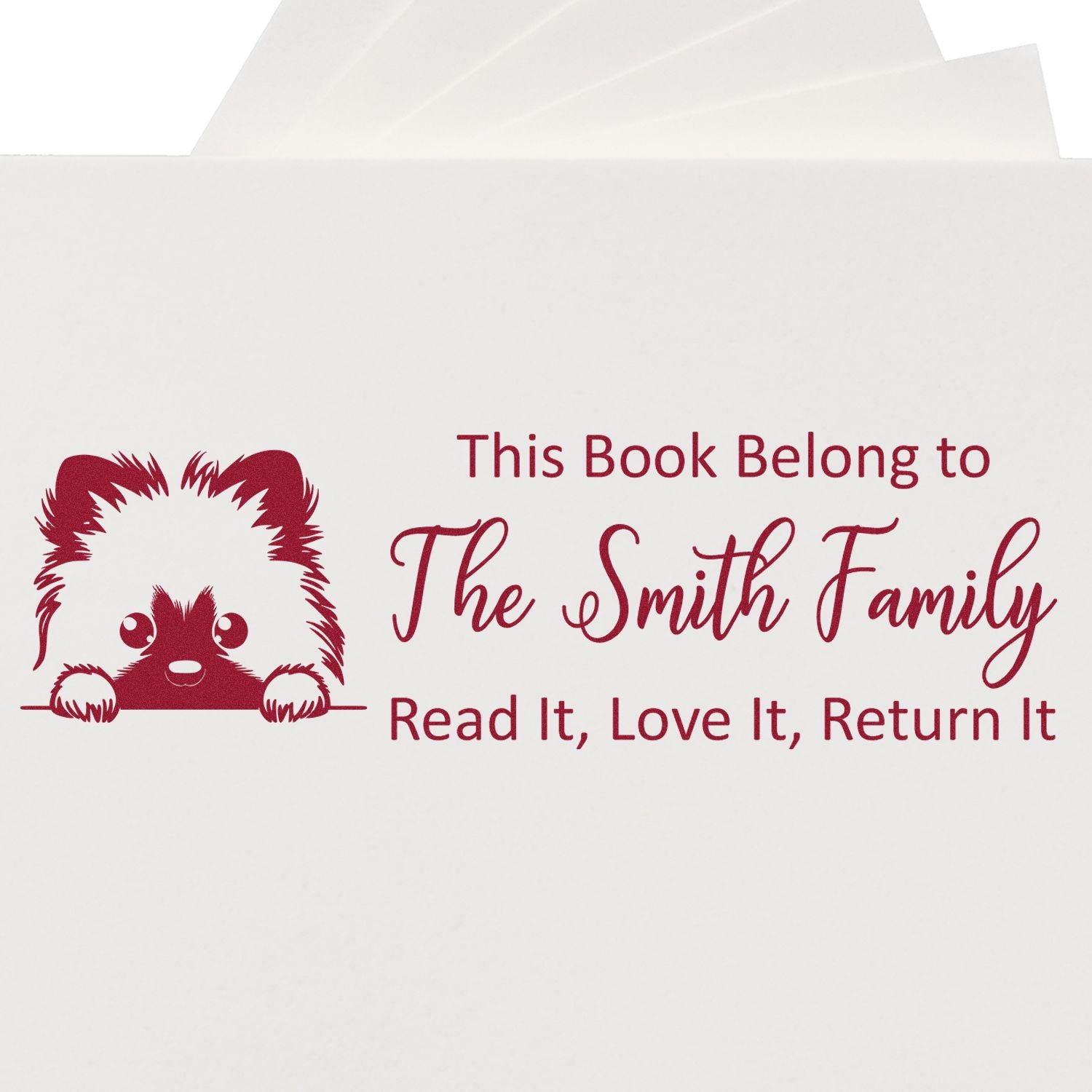 Custom rubber stamp bookplate with cat design and return notice for The Smith Family library.