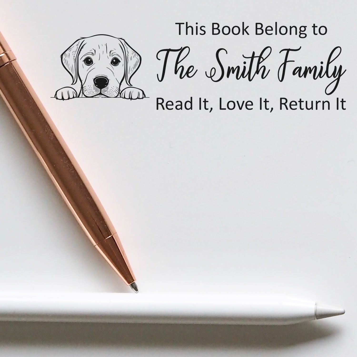 Personalized dog-themed rubber book stamp for family library books: This Book Belong to The Smith Family, Read It, Love It, Return It.