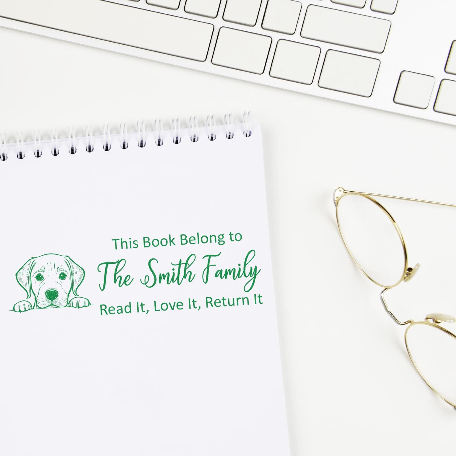 Personalized dog-themed book stamp for The Smith Family, with Read It, Love It, Return It custom library ownership text.