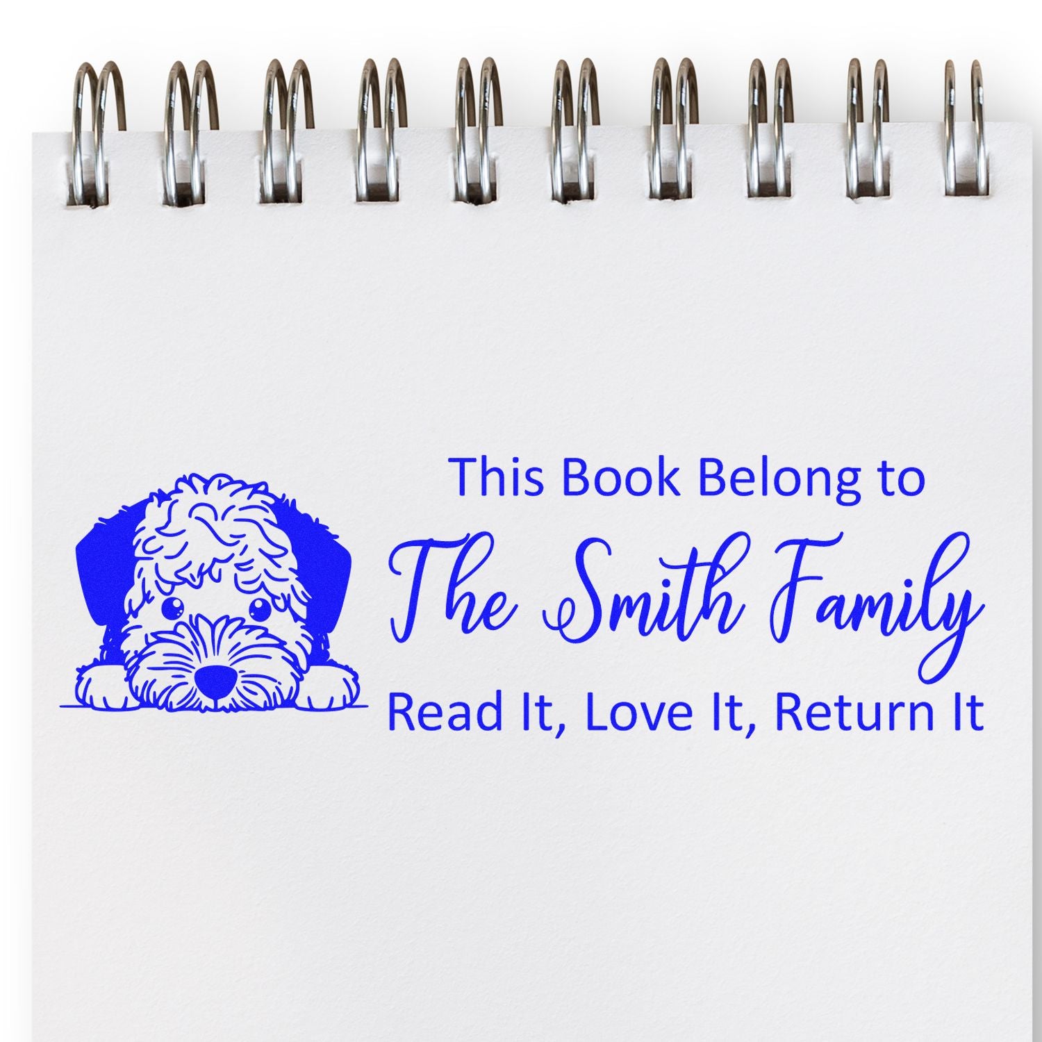 Custom rubber book stamp for The Smith Family with dog illustration and Read It, Love It, Return It message.