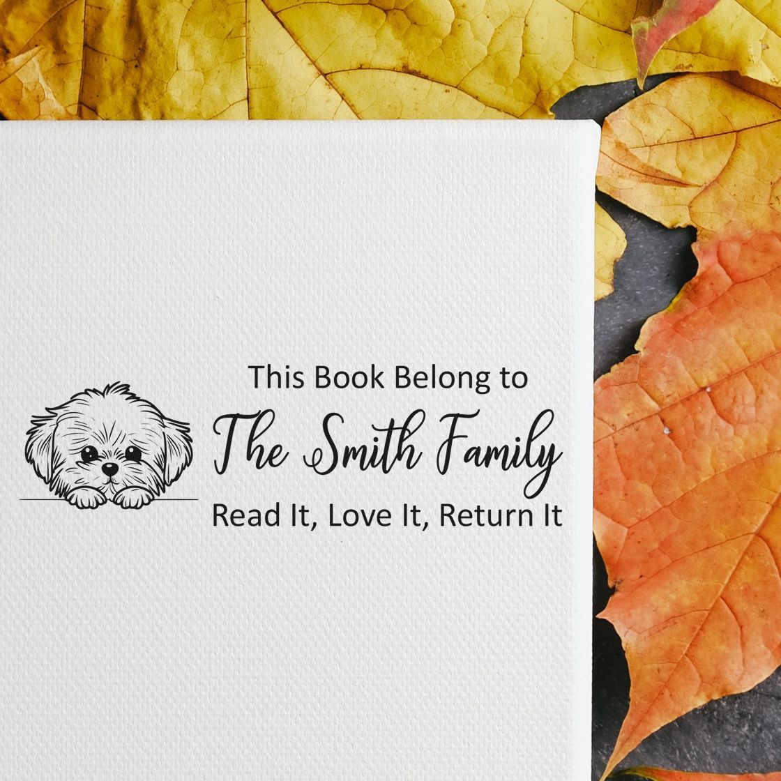 Personalized book stamp with dog illustration and Read it, love it, return it message for The Smith Family.