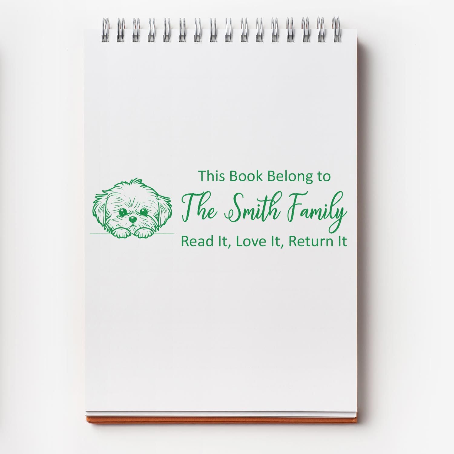 Personalized rubber stamp for books featuring The Smith Family and dog design with Read It, Love It, Return It message.