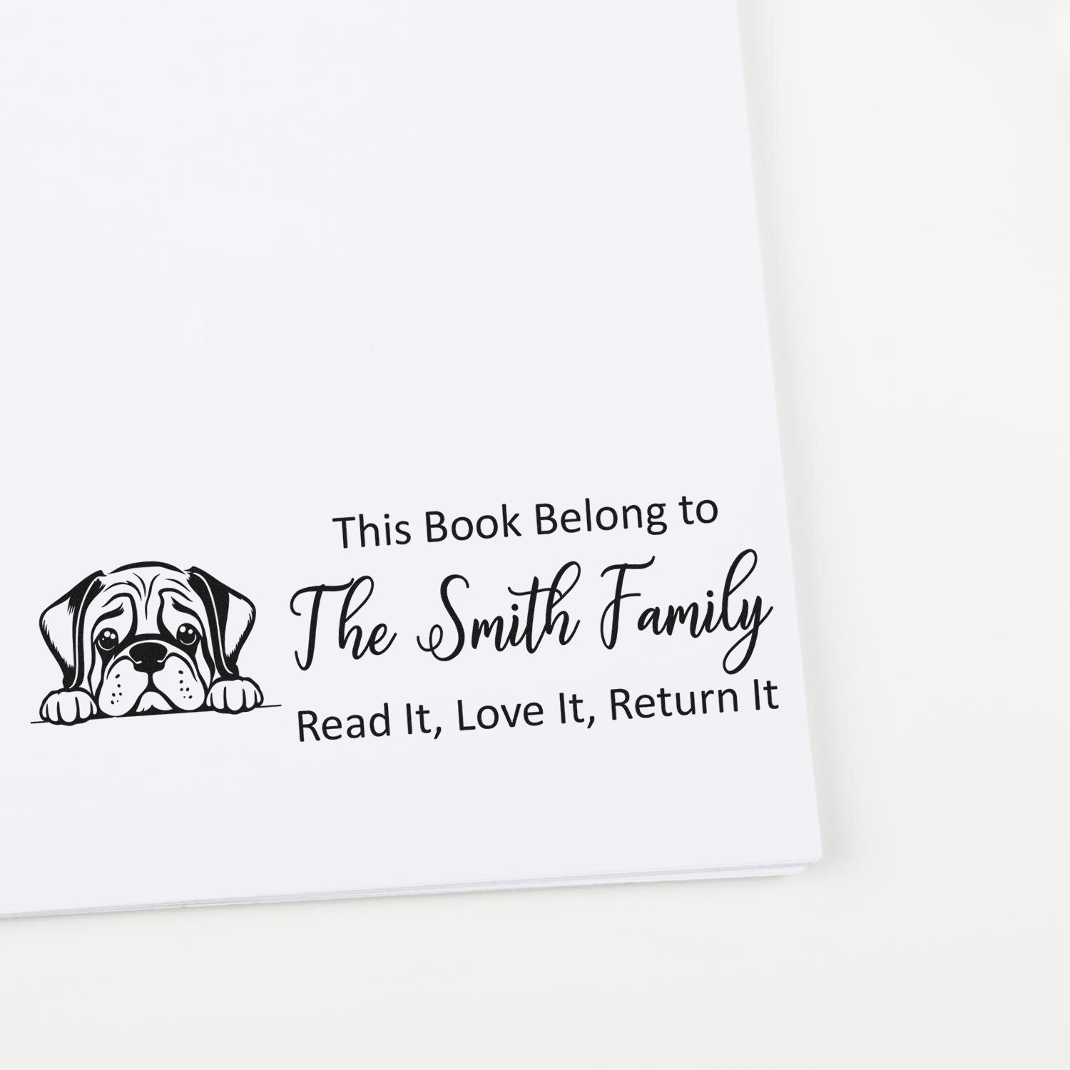 Personalized dog book stamp for The Smith Family, with This Book Belongs To and return reminder for borrowed books.