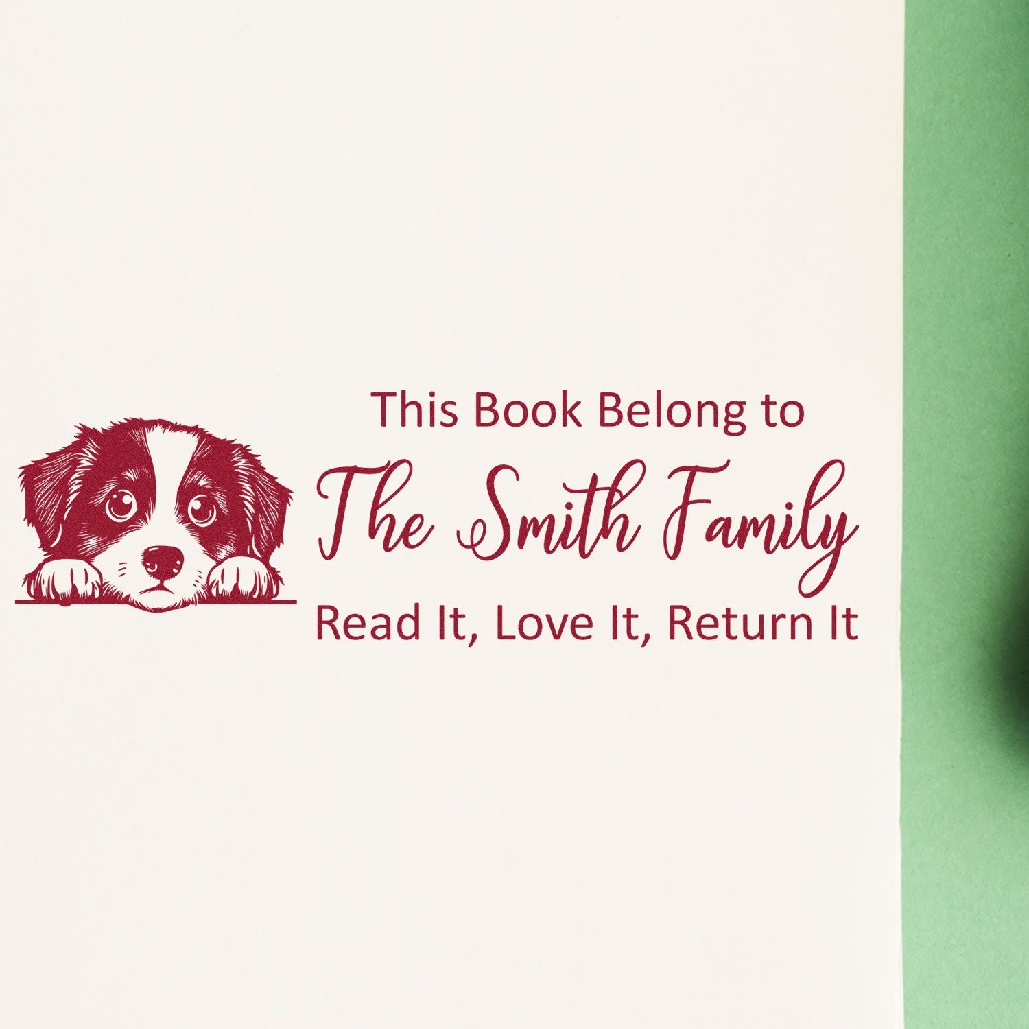 Personalized rubber book stamp with dog illustration for The Smith Family, Read It, Love It, Return It.