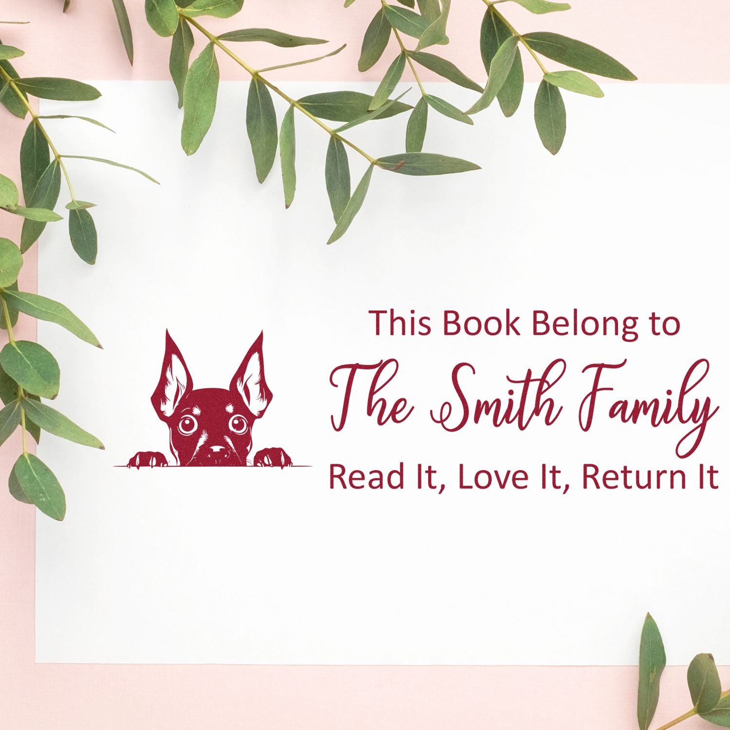 Custom book rubber stamp with dog design and family name: This Book Belongs to The Smith FamilyRead It, Love It, Return It.