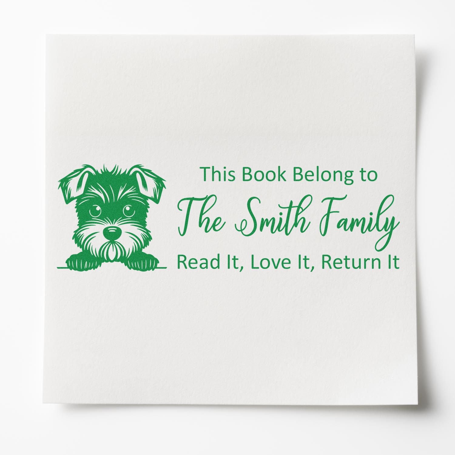 Personalized book rubber stamp with dog icon and This Book Belong to The Smith Family plus Read It, Love It, Return It.