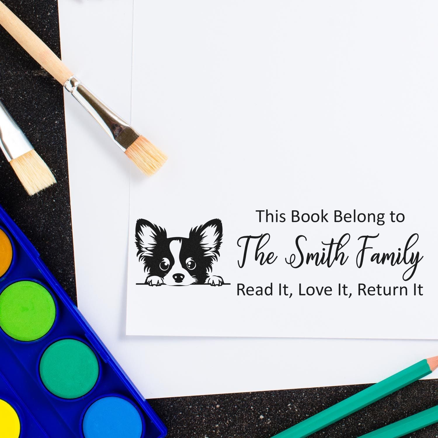 Personalized corgi book plate stamp for The Smith Family with Read It, Love It, Return It message.