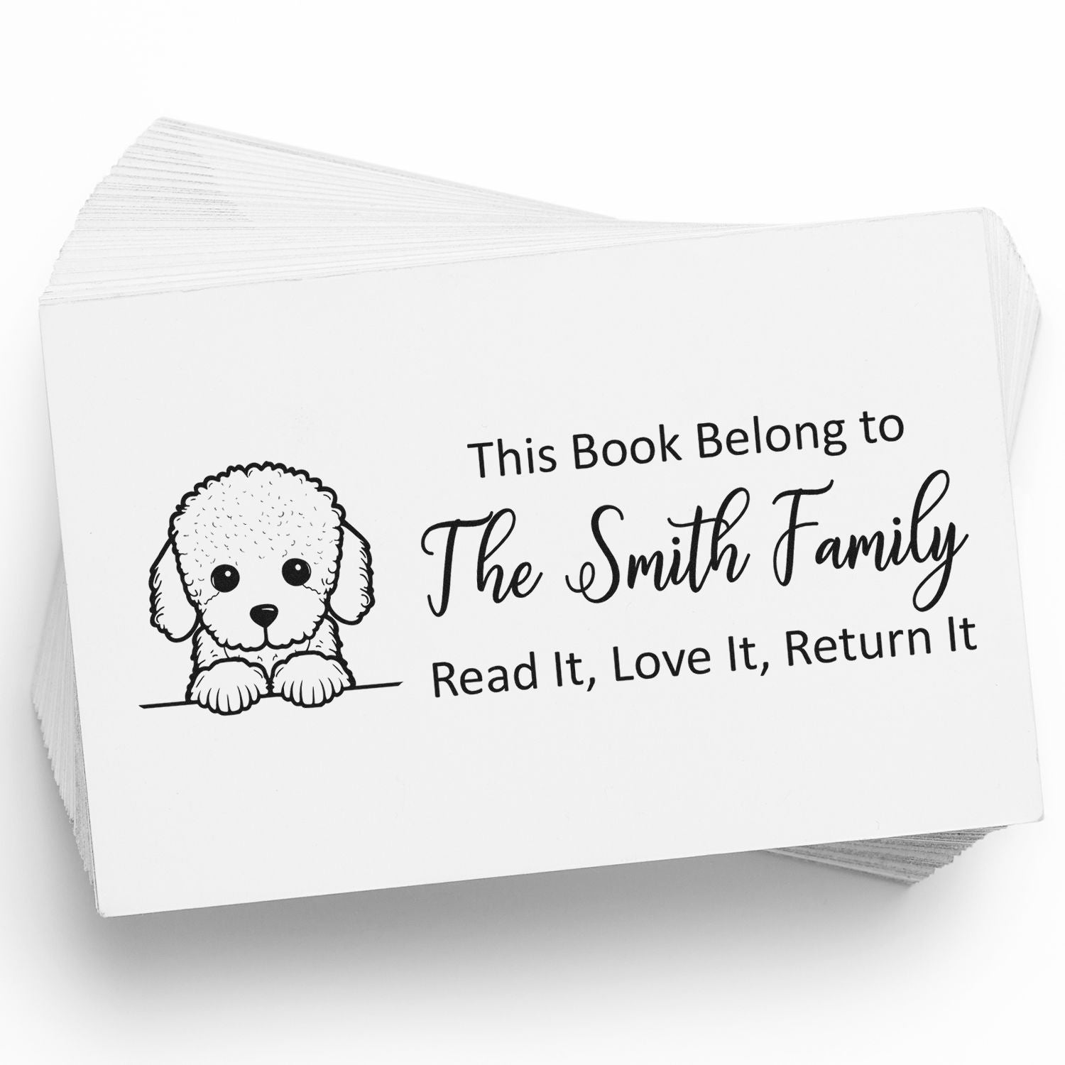 Personalized rubber book stamp with dog illustration for The Smith Family, reading Read It, Love It, Return It for book returns.