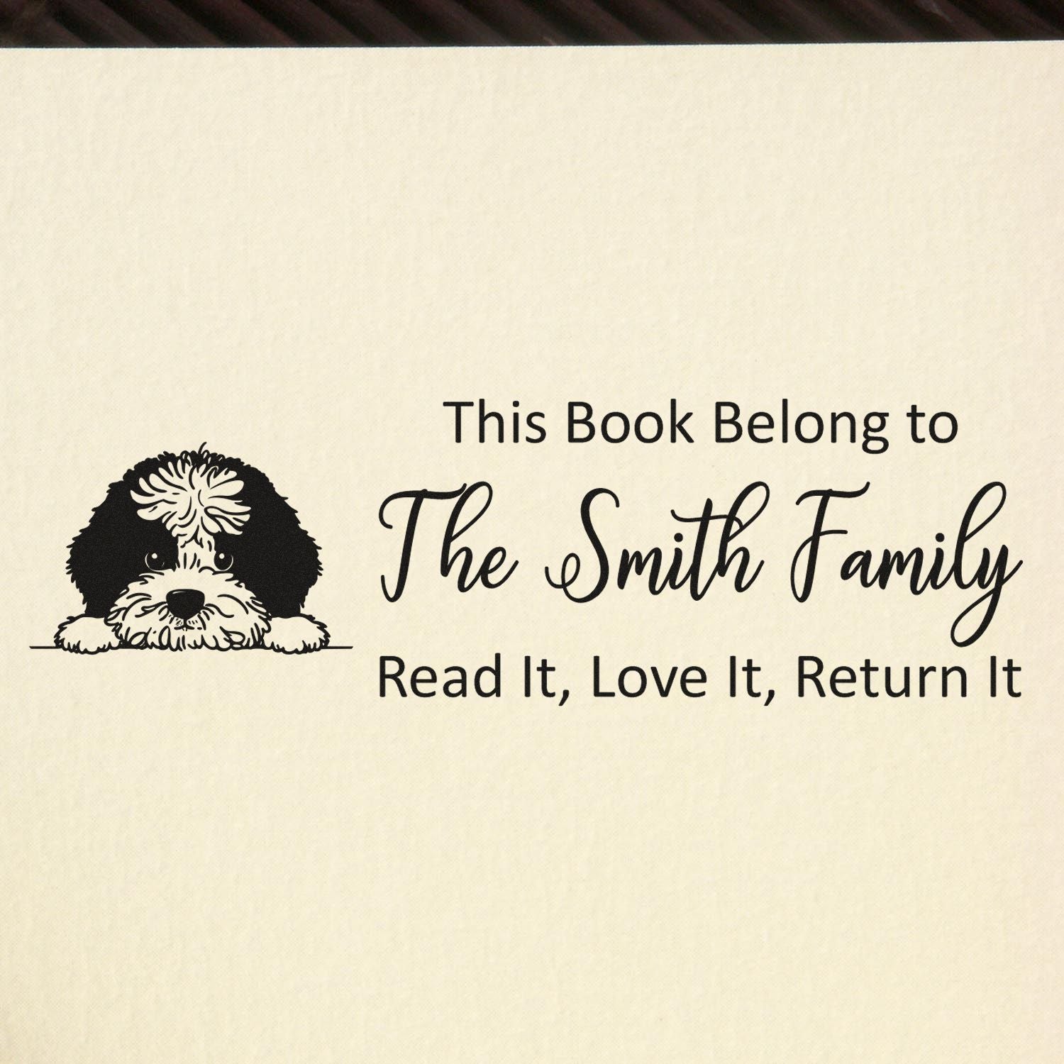 Custom bookplate rubber stamp with dog illustration and family name: This Book Belong to The Smith FamilyRead It, Love It, Return It.