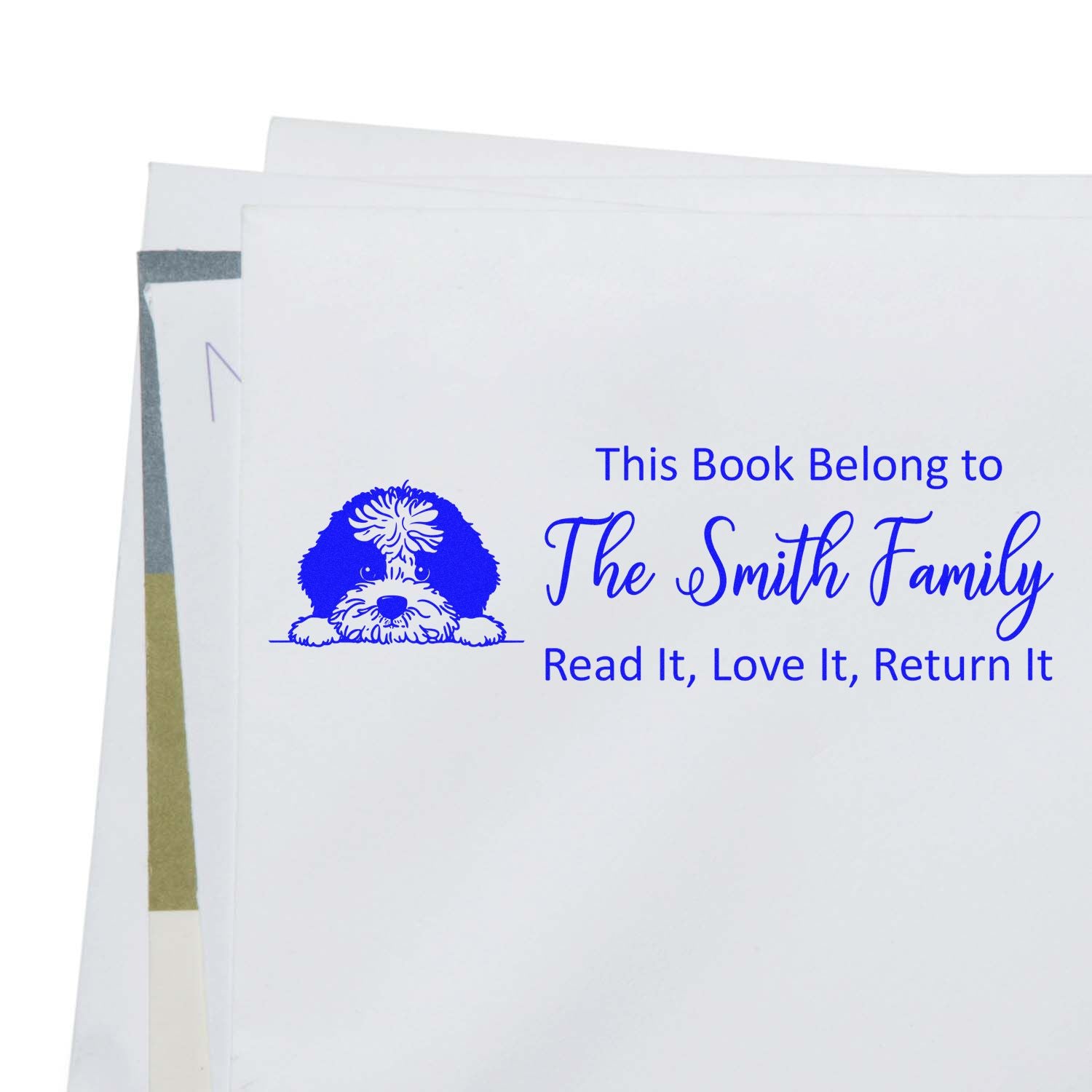 Personalized book stamp with dog illustration and return message for The Smith Family: Read It, Love It, Return It.