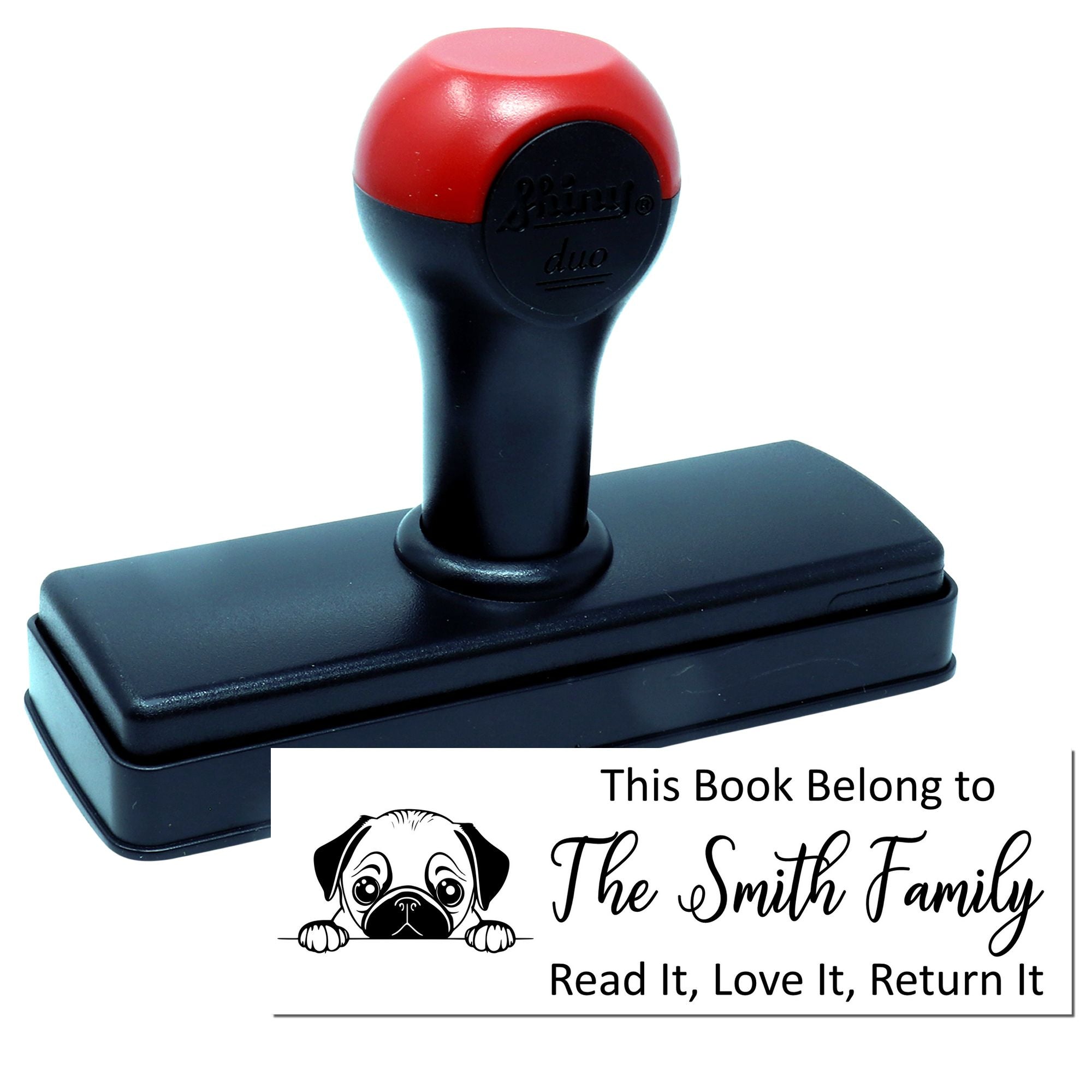 Custom self-inking book stamp with dog graphic, personalized This Book Belongs to The Smith Family return-your-book design.