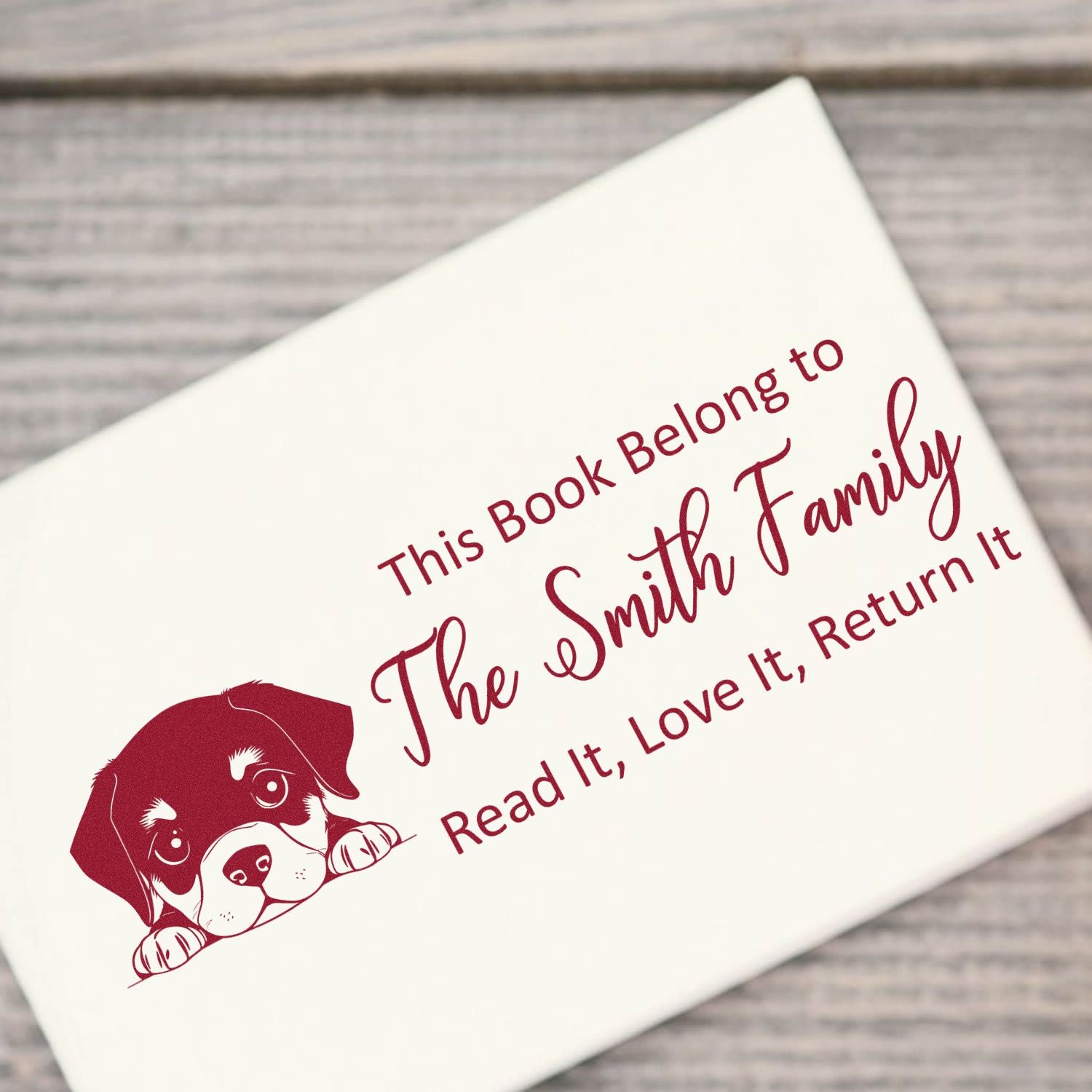 Custom dog bookplate rubber stamp with This Book Belongs to The Smith Family, Read It, Love It, Return It.