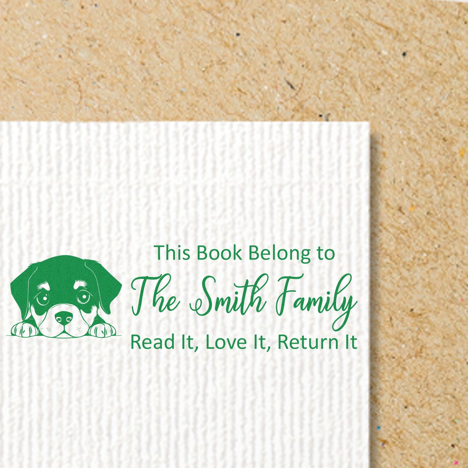 Personalized book rubber stamp with dog design: This Book Belongs to The Smith Family, Read It, Love It, Return It.