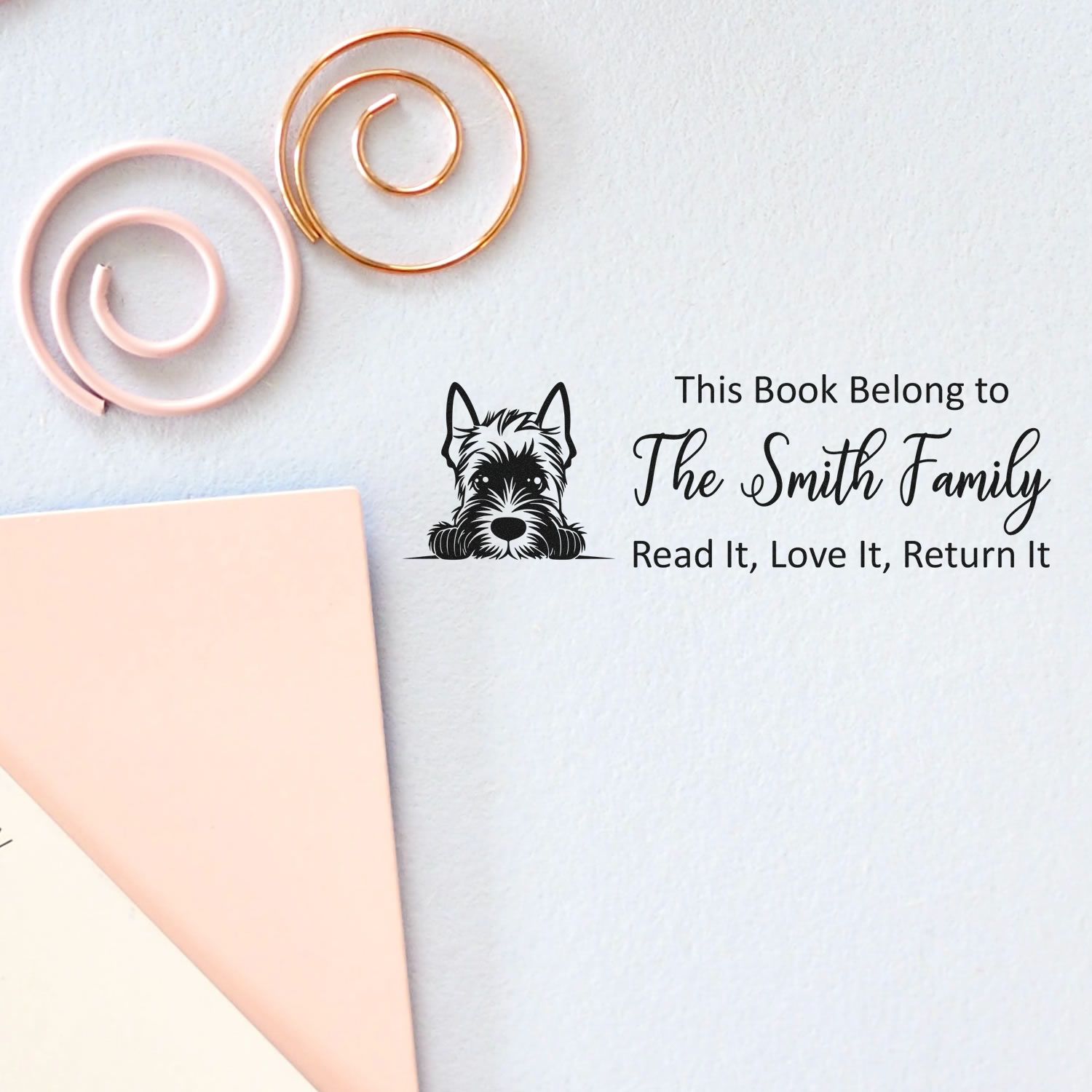 Custom dog book stamp with This Book Belongs to The Smith Family for personal library book return labels.