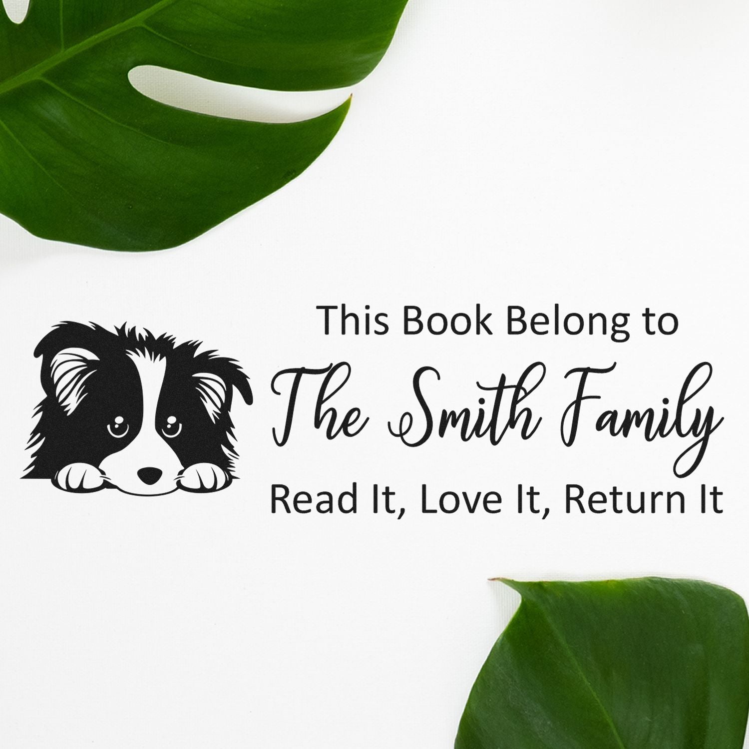 Custom rubber book stamp with dog design for The Smith Family, reading Read It, Love It, Return It.