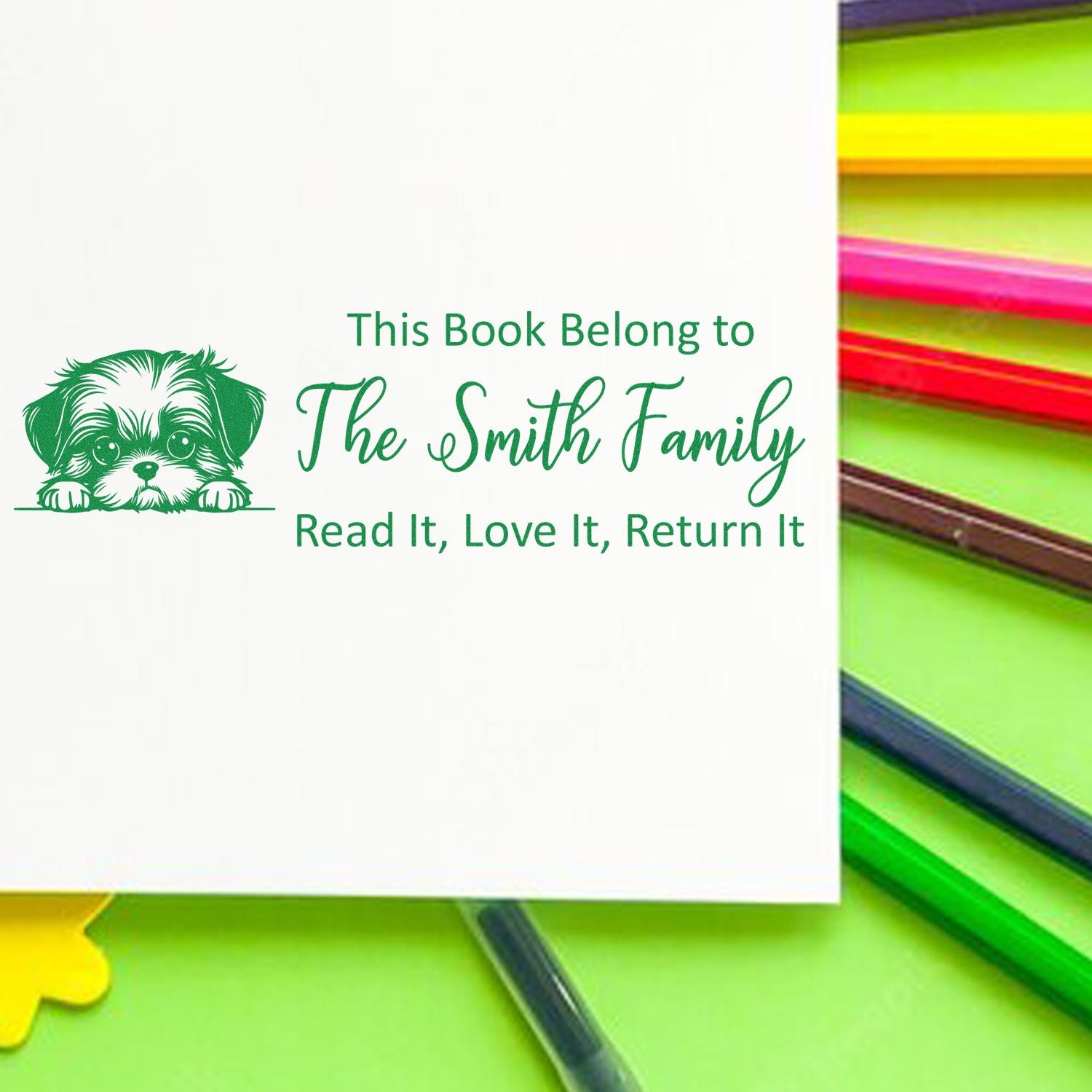 Custom rubber book stamp for personalized libraries: This Book Belongs to The Smith Family, Read It, Love It, Return It.