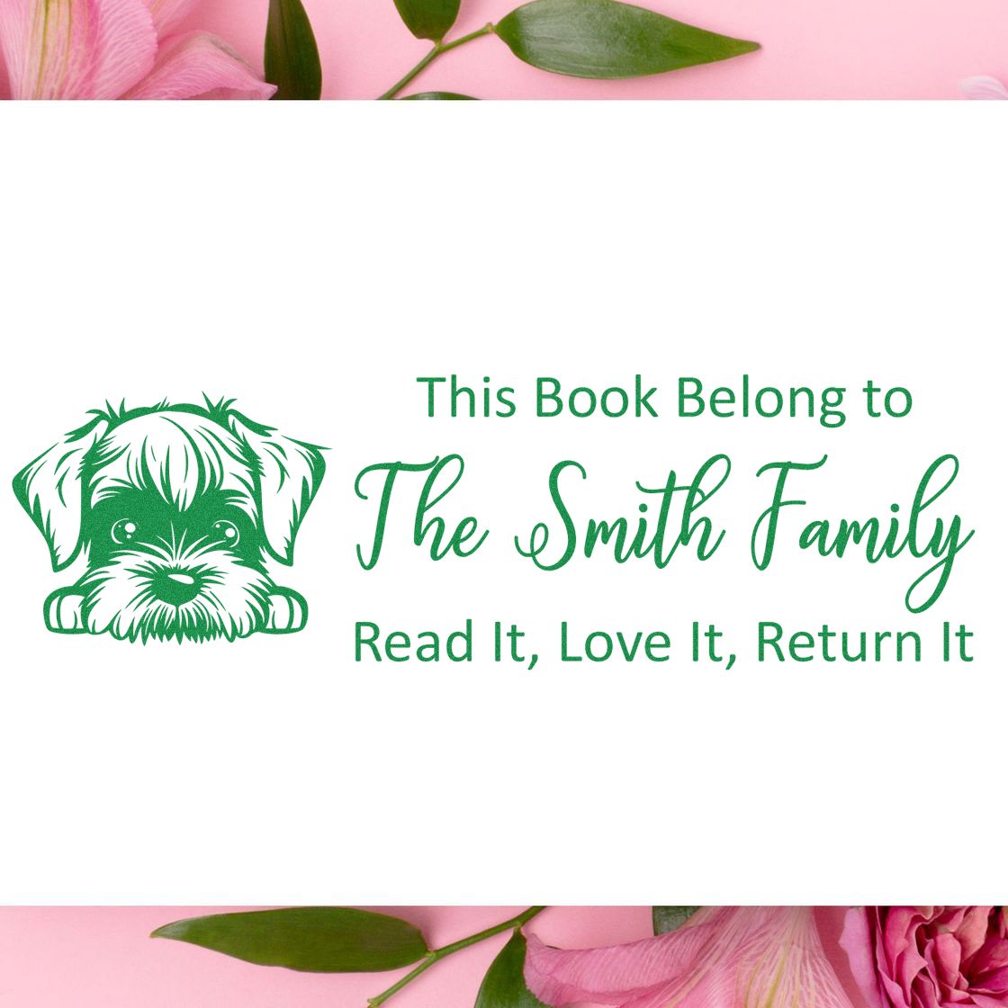 Custom rubber book stamp with dog illustration, personalized family name, and Read It, Love It, Return It lending message.
