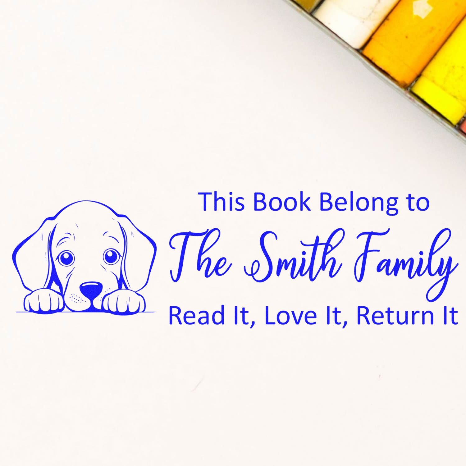 Custom dog-themed book stamp for The Smith Family, reading Read It, Love It, Return It for personal library books.