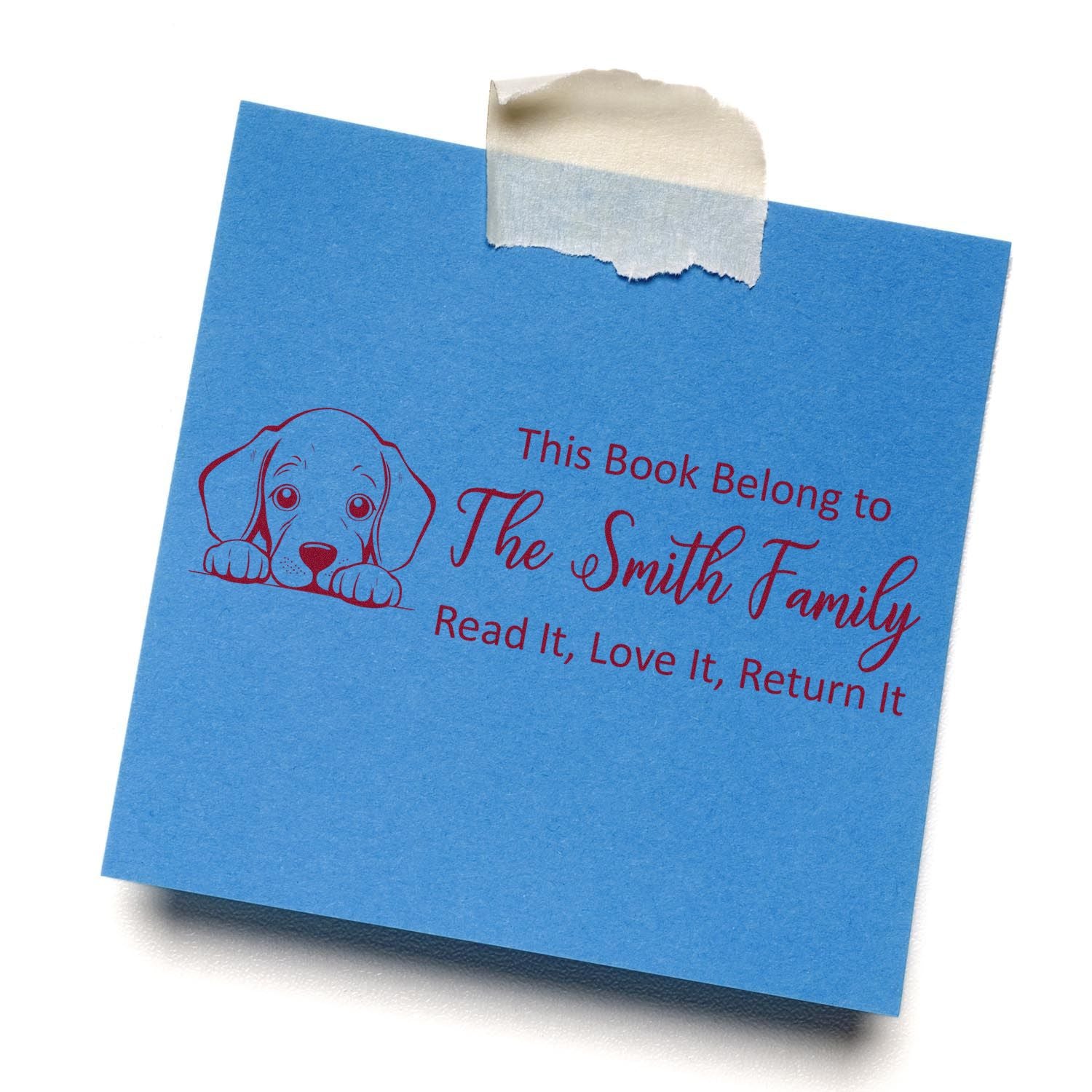 Custom rubber book stamp with puppy illustration and family name, reading This Book Belongs to The Smith Family, Read It, Love It, Return It.