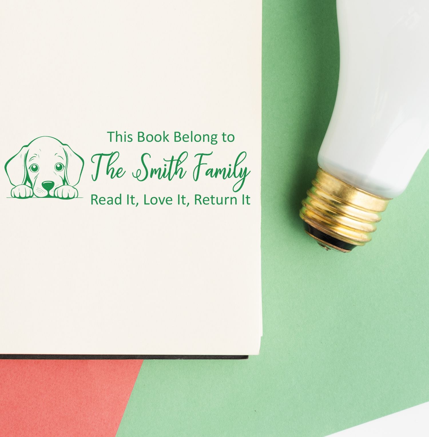 Custom dog-themed rubber book stamp for personalized library books, reading This Book Belongs to The Smith Family, Read It, Love It, Return It.