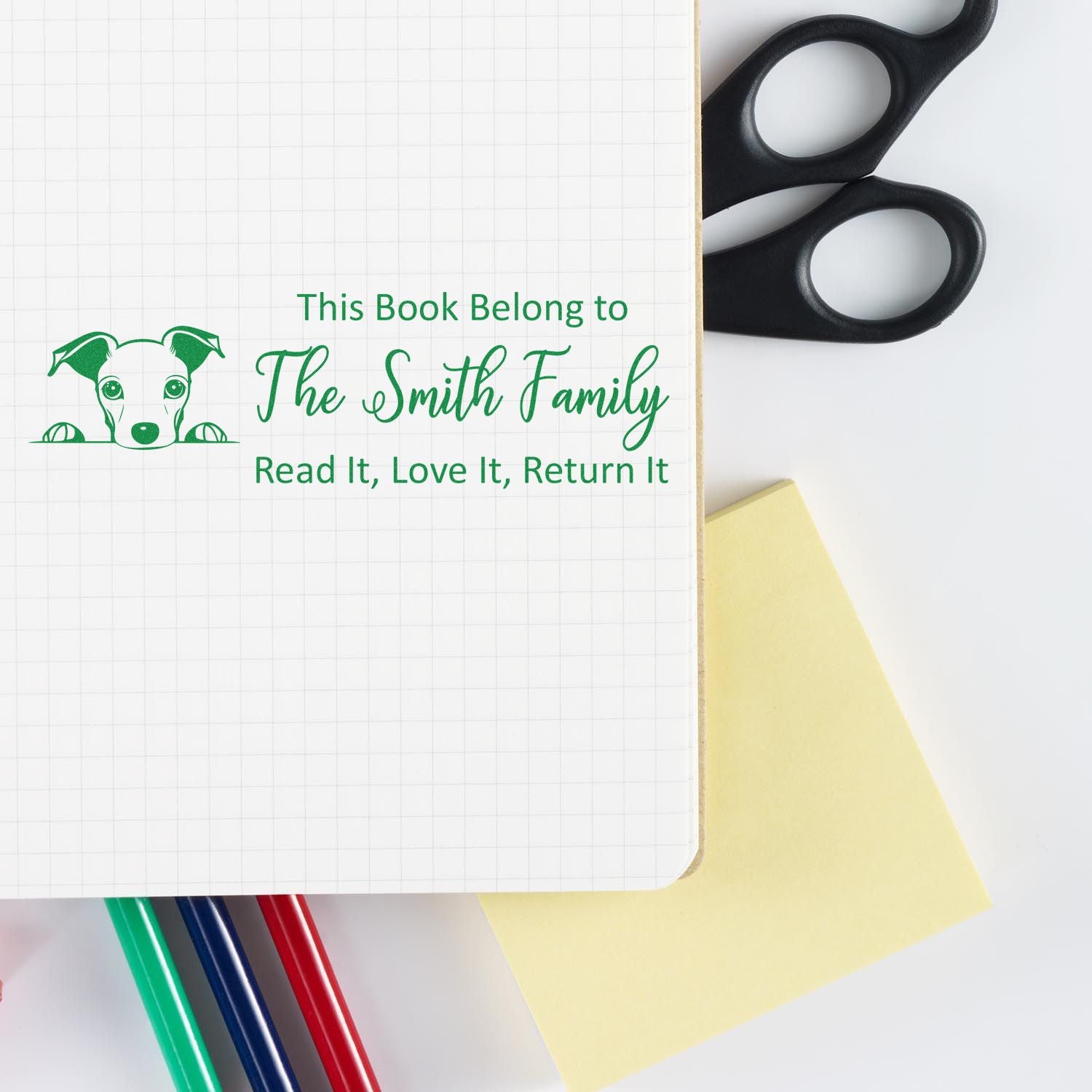 Personalized book stamp with dog design and family name for books marked, This Book Belongs to The Smith Family, Read It, Love It, Return It.