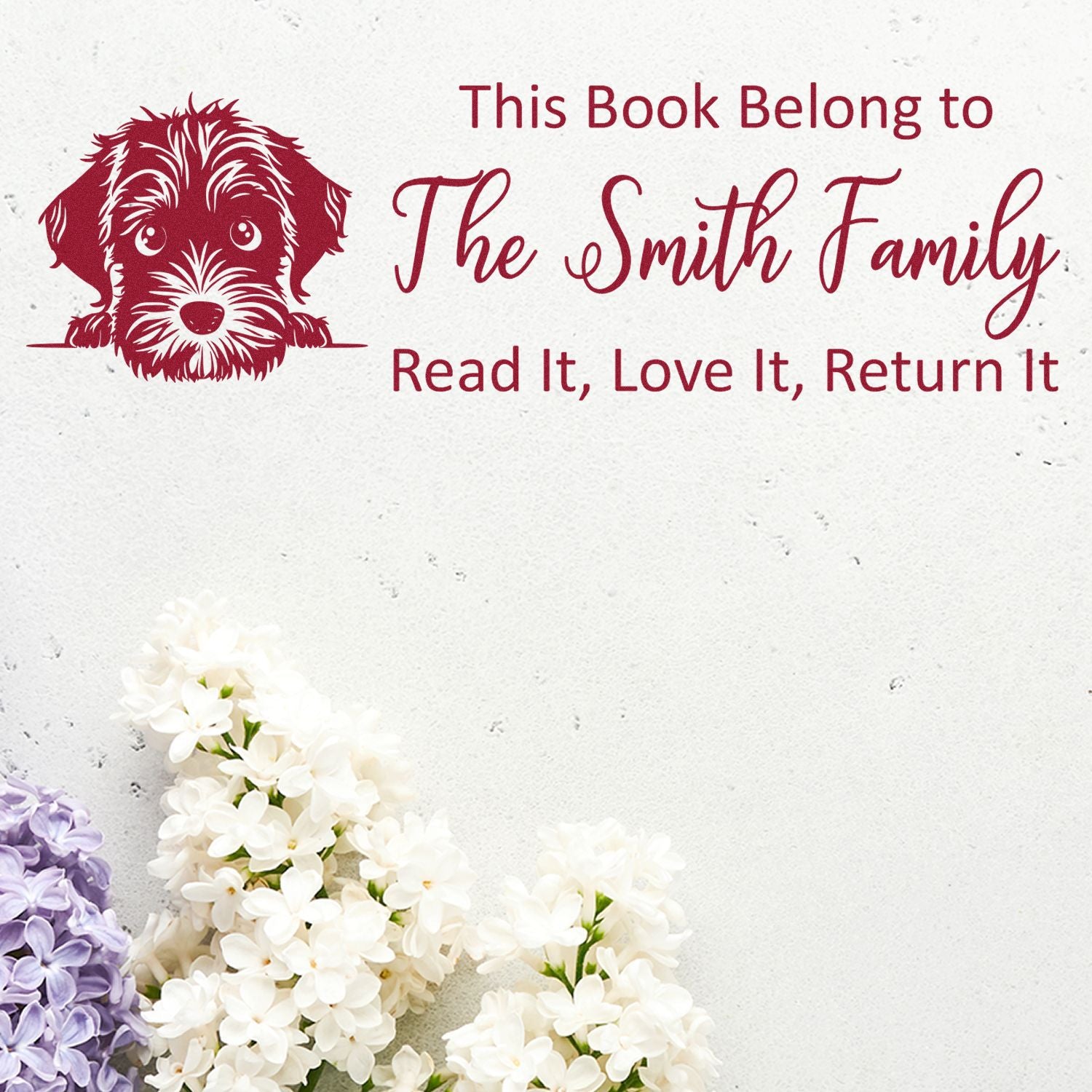 Personalized dog book stamp with This Book Belongs to The Smith Family and Read It, Love It, Return It ex libris design.