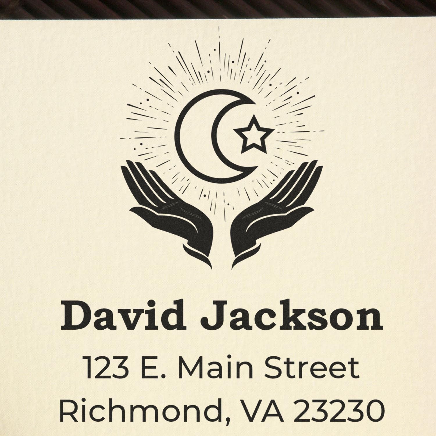Custom return address rubber stamp with moon and star hands design, David Jackson, 123 E. Main Street, Richmond, VA 23230.