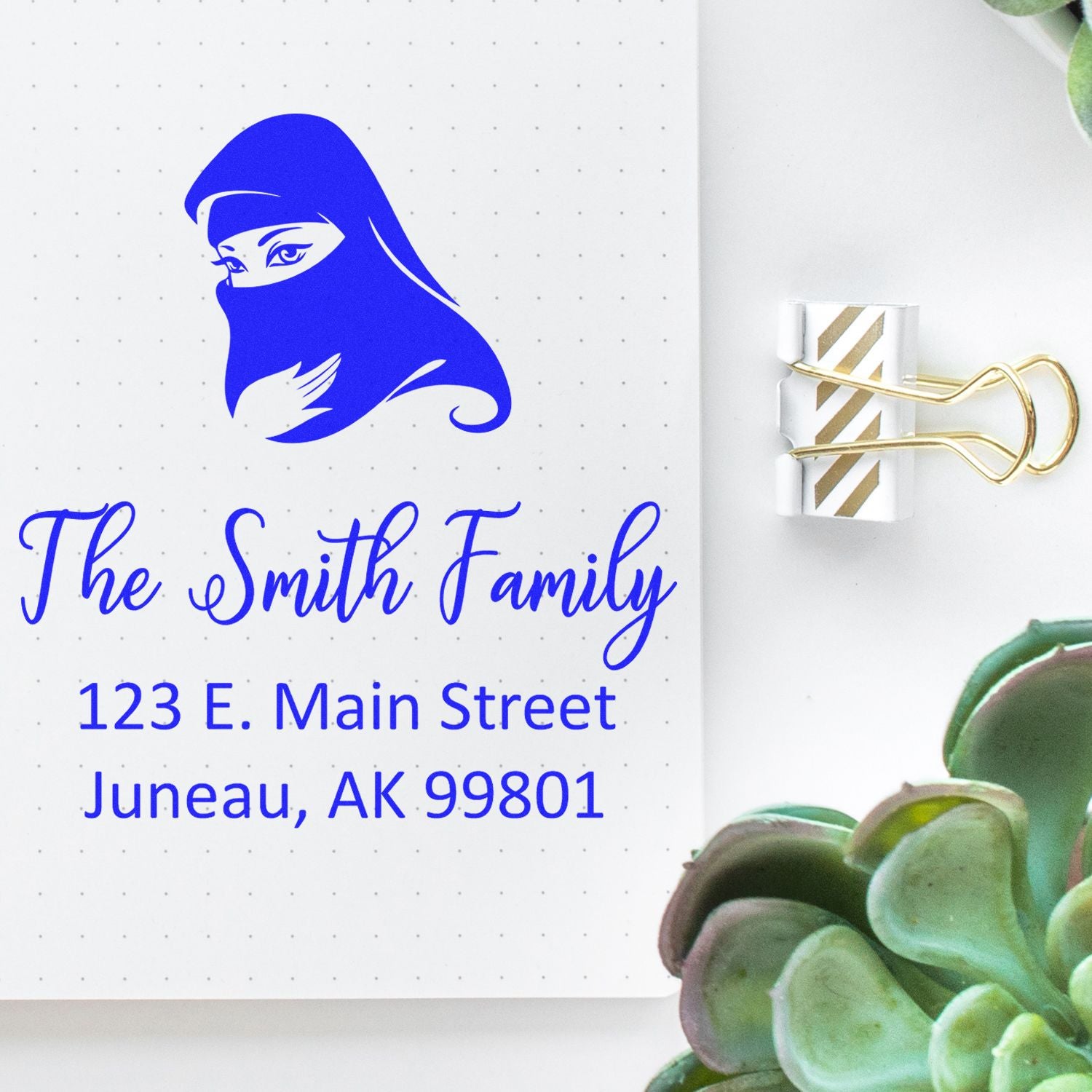 Custom return address rubber stamp for The Smith Family with hijab logo and personalized mailing address.