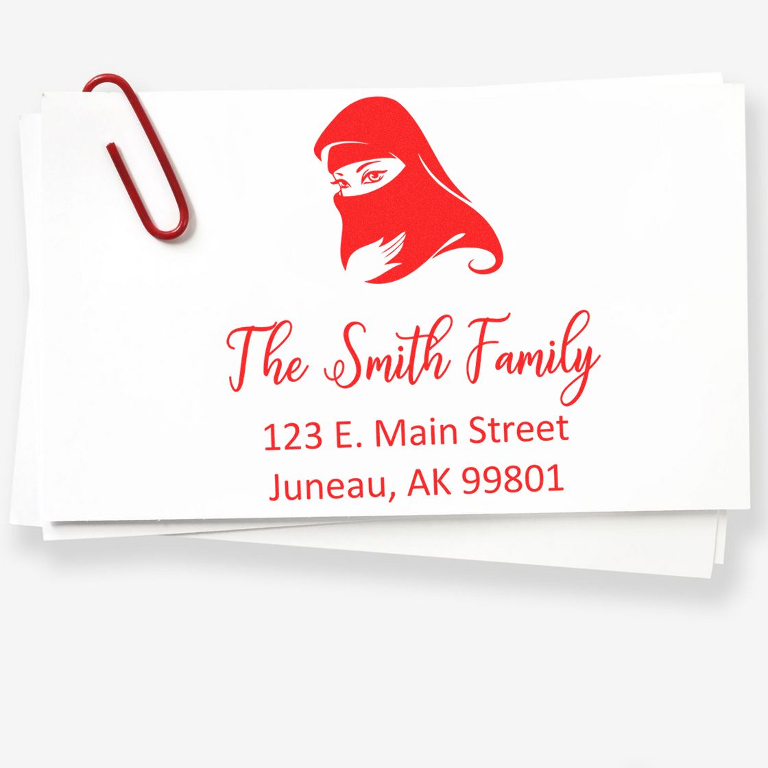 Custom return address rubber stamp for The Smith Family with elegant logo design and Juneau, AK address.