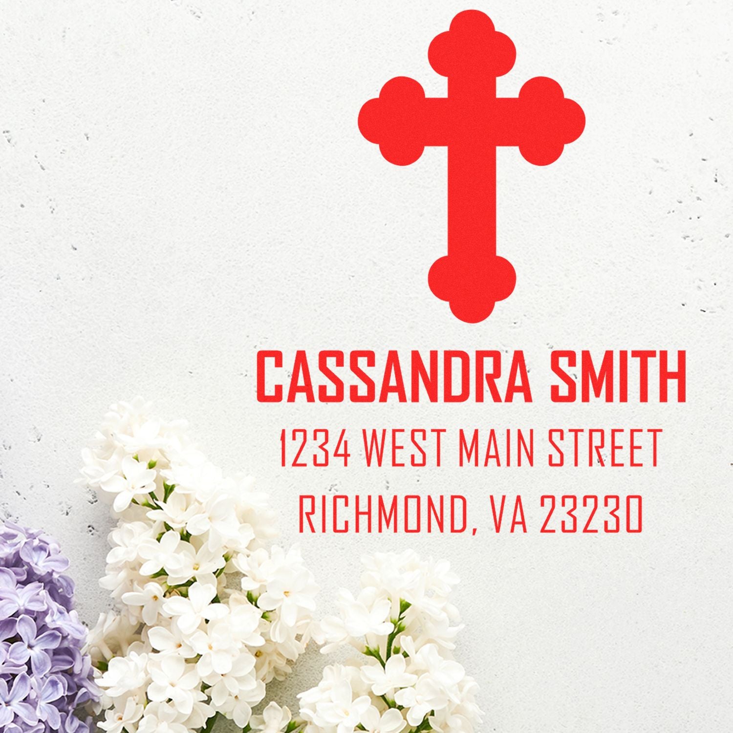 Custom rubber address stamp with red cross logo for Cassandra Smith, Richmond, VA return mailing.