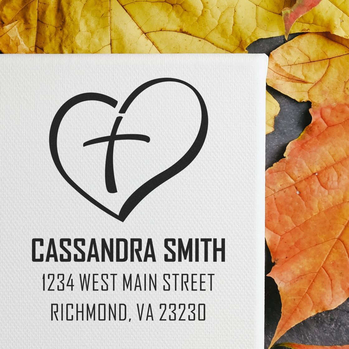 Personalized return address rubber stamp with heart and cross design for Cassandra Smith, Richmond, VA.