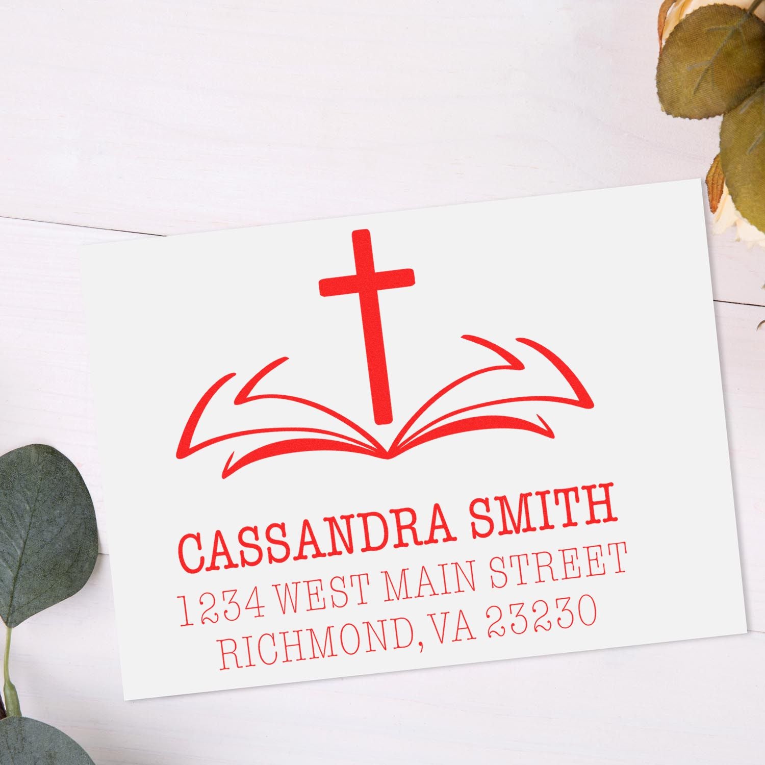 Custom Christian return address rubber stamp with cross and open Bible logo for Cassandra Smith, Richmond, VA.