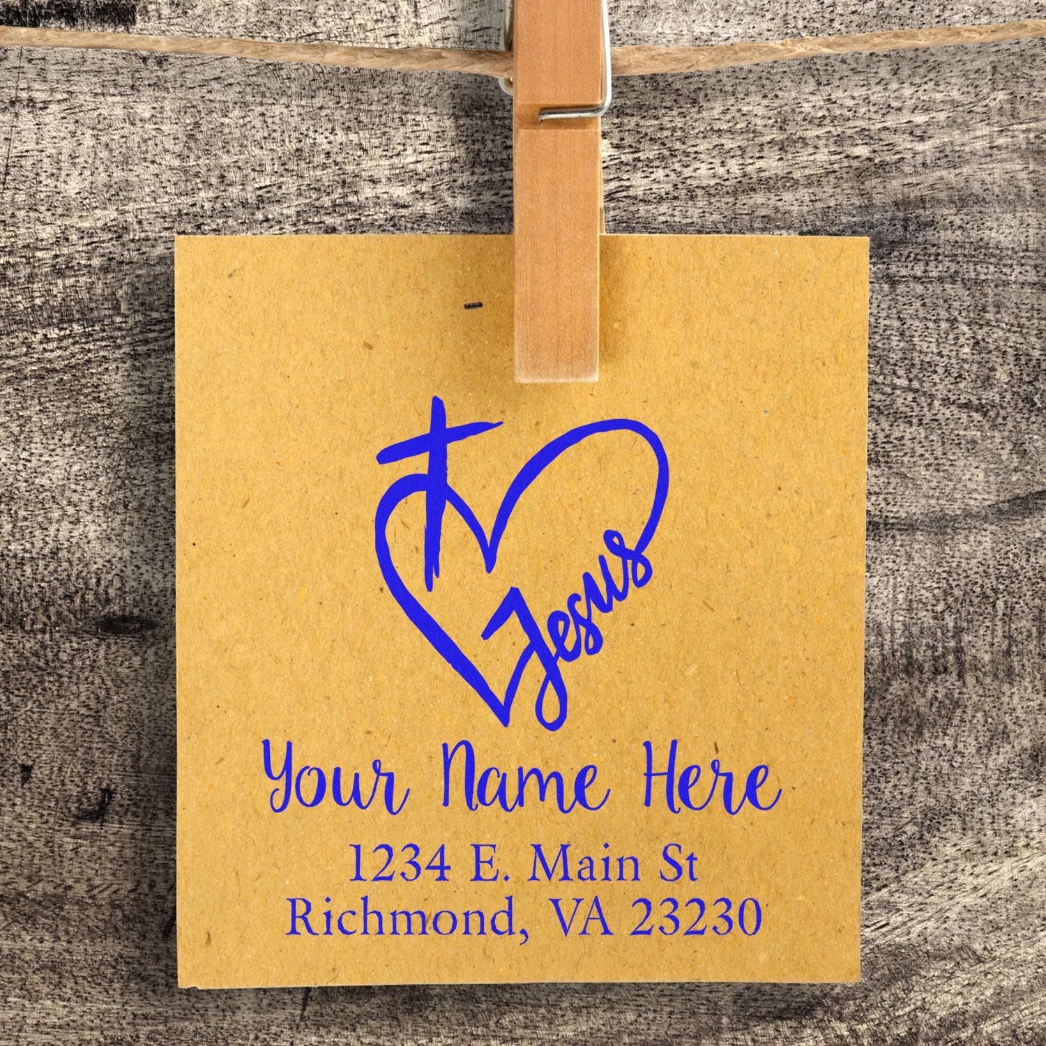 Custom rubber stamp return address with Jesus heart design, personalized name line, and Richmond, VA address on kraft paper.