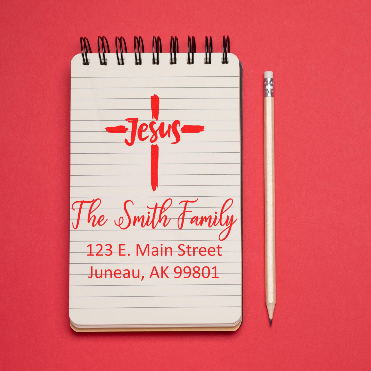 Custom Christian address rubber stamp design for The Smith Family with Jesus cross and Juneau, AK return address.