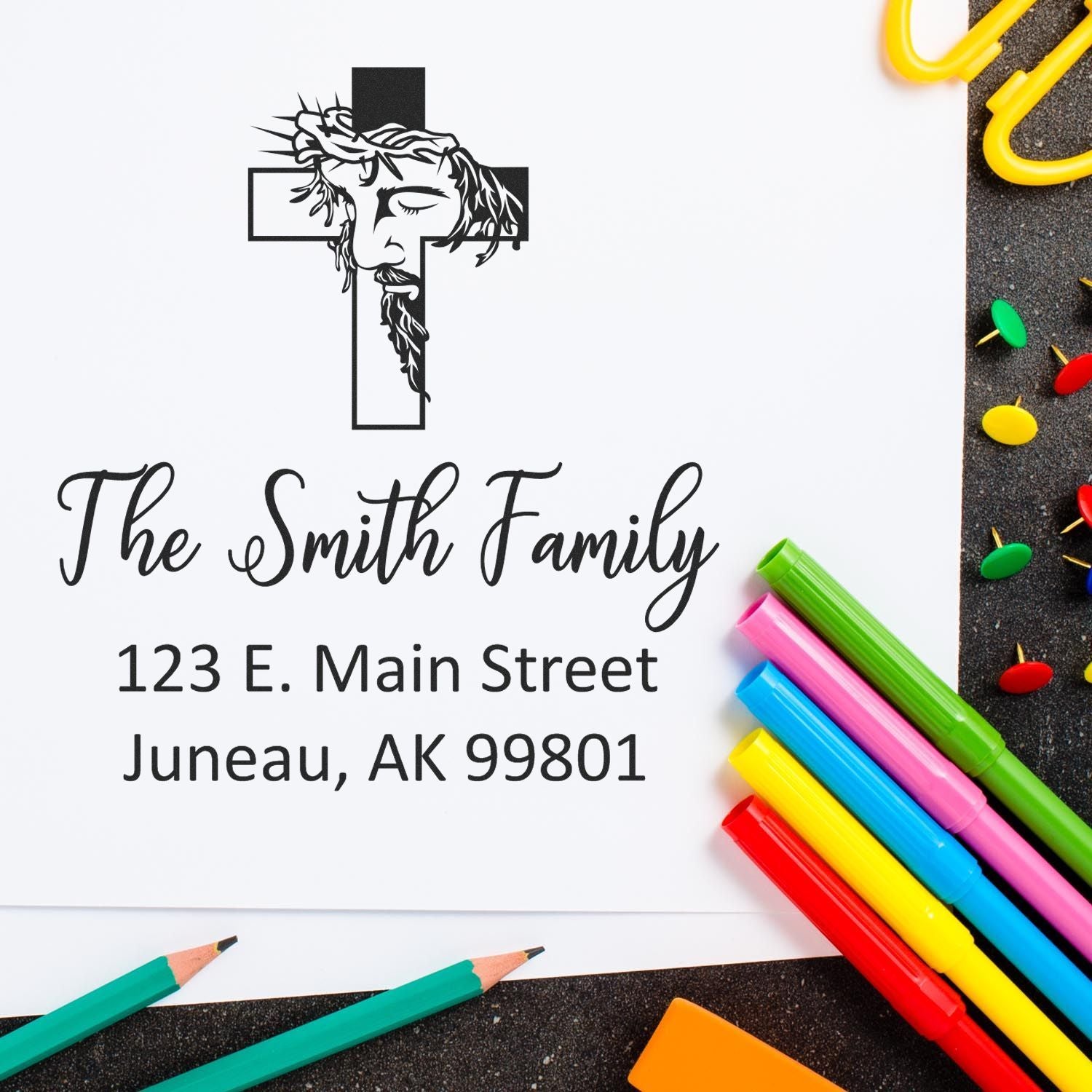 Custom Christian family return address rubber stamp with cross and Jesus design, personalized for The Smith Family, Juneau AK.