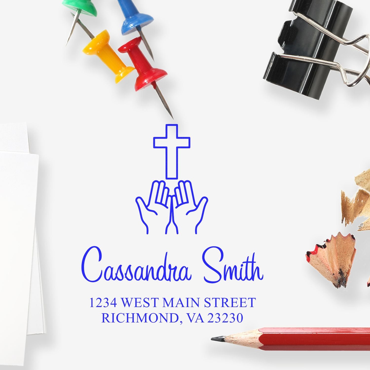 Custom return address rubber stamp for Cassandra Smith with cross and praying hands design, Richmond, VA 23230.