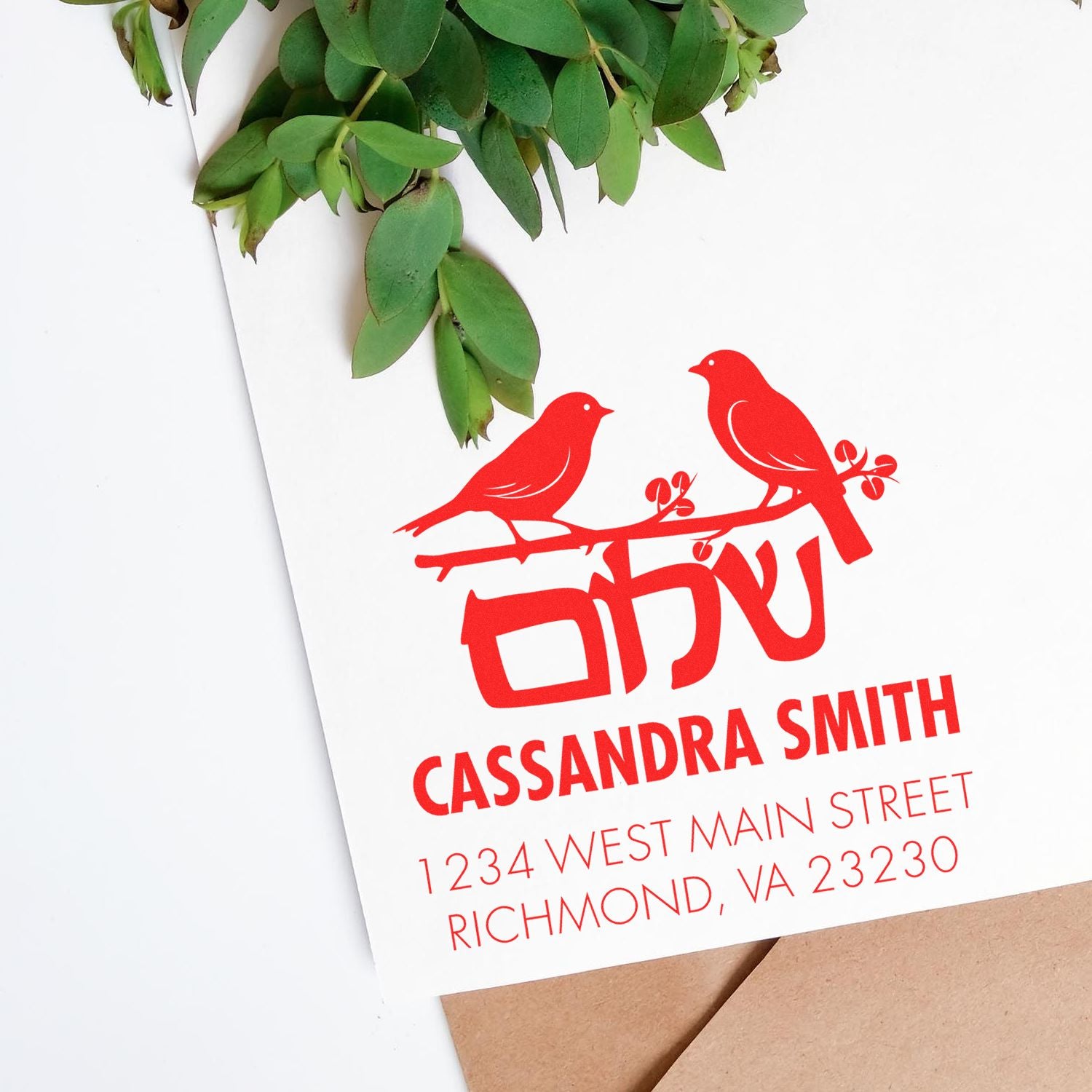 Personalized rubber address stamp with birds for Cassandra Smith, including name and Richmond, VA mailing address.